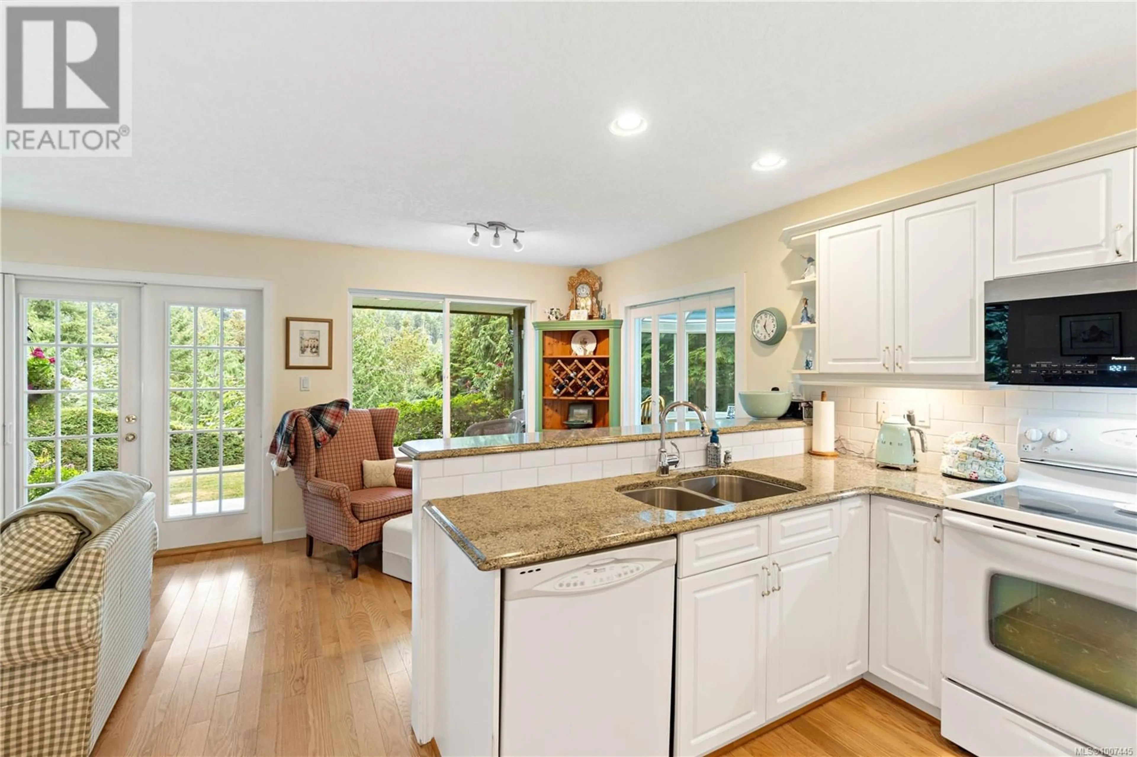 Open concept kitchen, ceramic/tile floor for 1651 ABBEY ROAD, Qualicum Beach British Columbia V9K2S3
