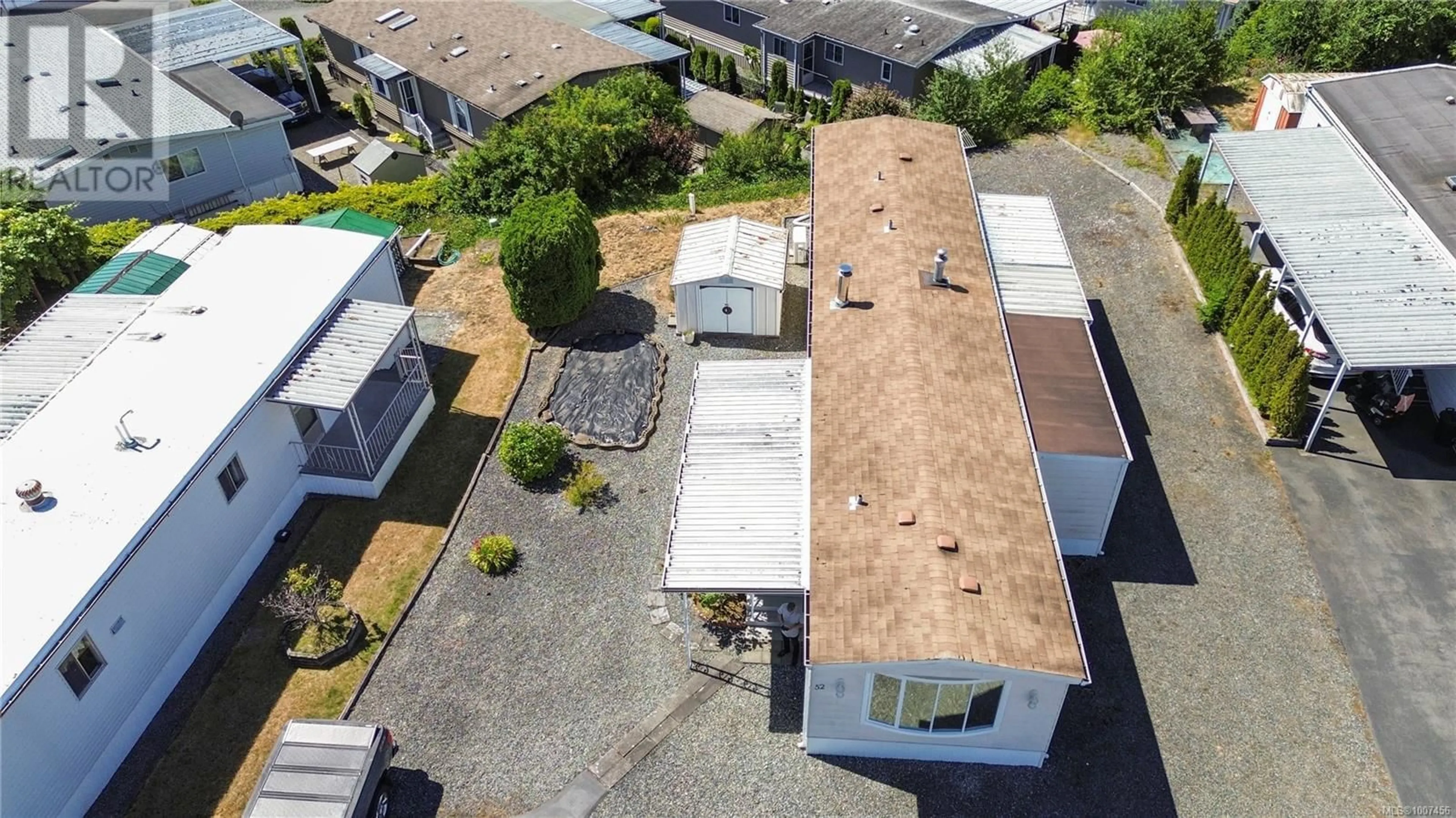 A pic from outside/outdoor area/front of a property/back of a property/a pic from drone, building for 52 - 6325 METRAL DRIVE, Nanaimo British Columbia V9T6P9