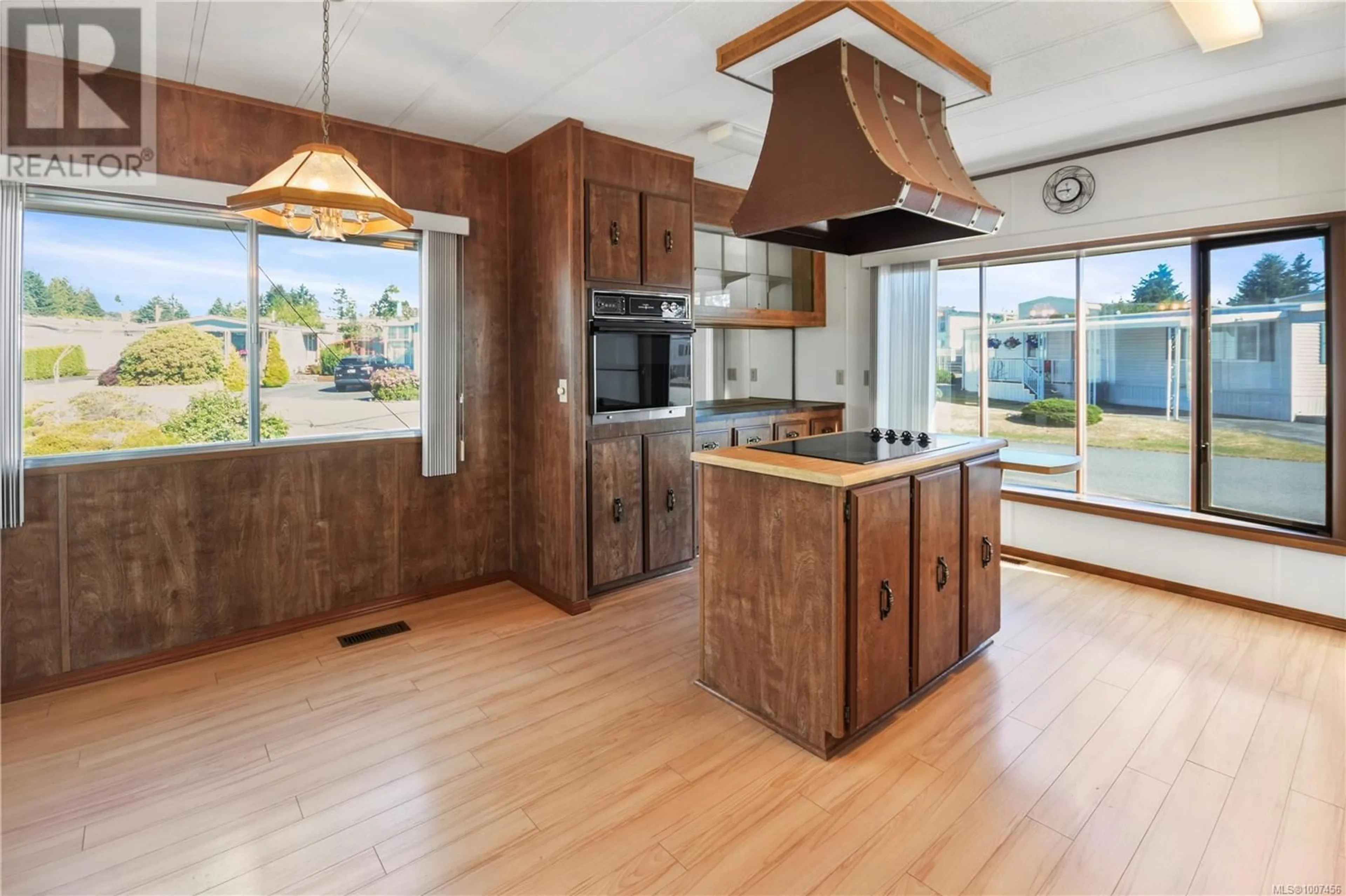 Open concept kitchen, wood/laminate floor for 52 - 6325 METRAL DRIVE, Nanaimo British Columbia V9T6P9