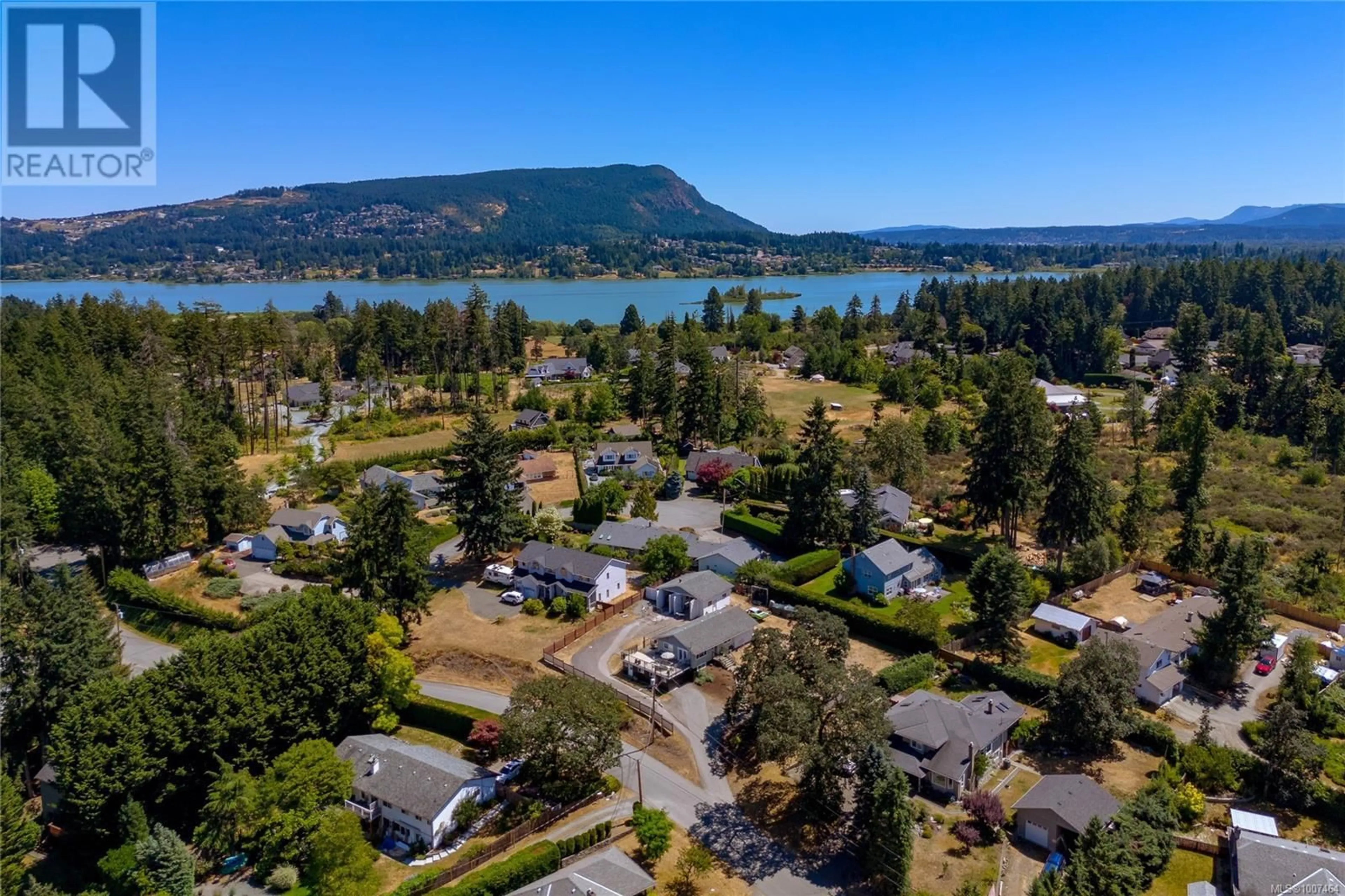 A pic from outside/outdoor area/front of a property/back of a property/a pic from drone, water/lake/river/ocean view for 6496 WICKS ROAD, Duncan British Columbia V9L5V3