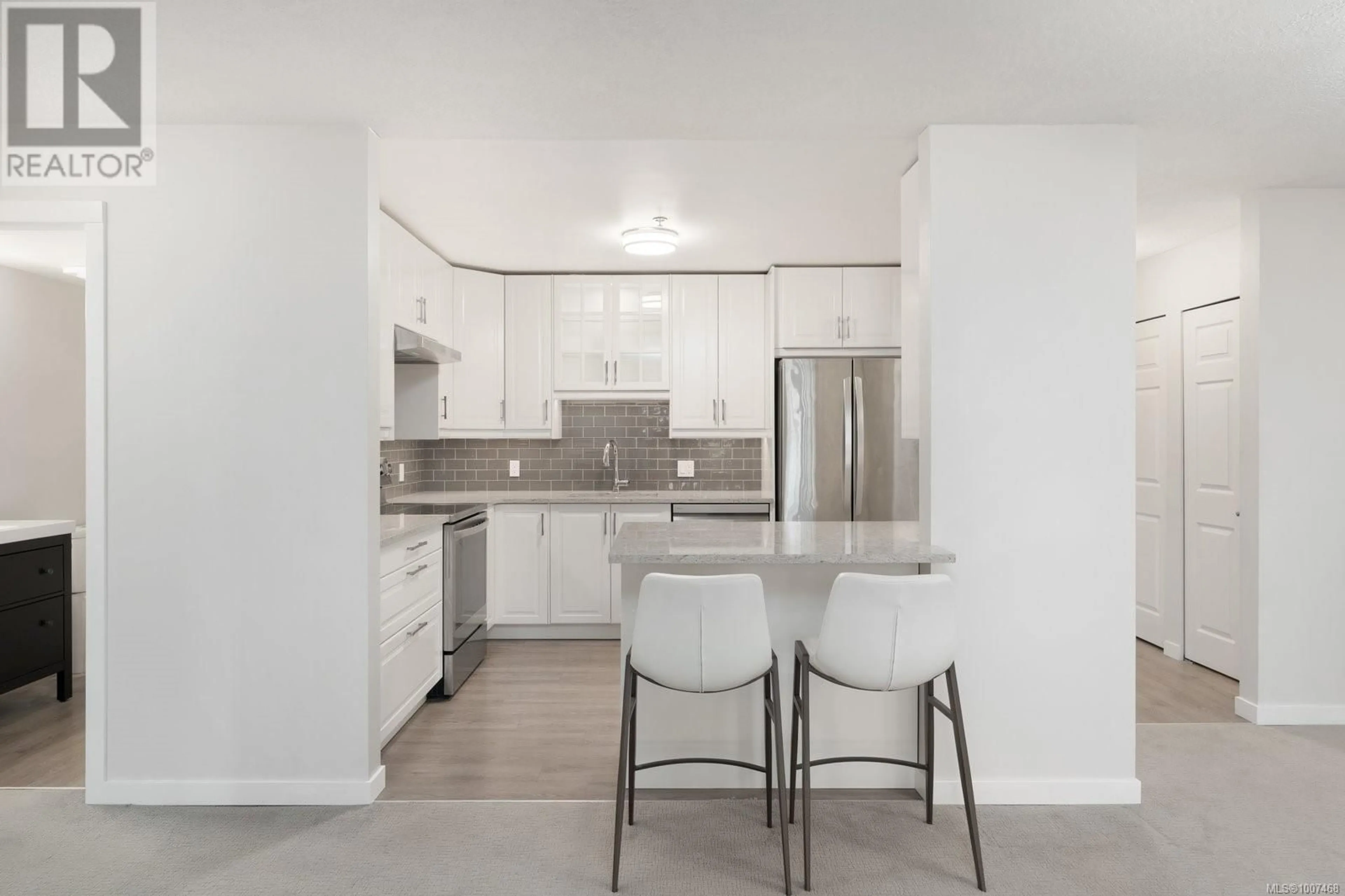 Open concept kitchen, unknown for 203 - 3363 GLASGOW AVENUE, Saanich British Columbia V8X1M5