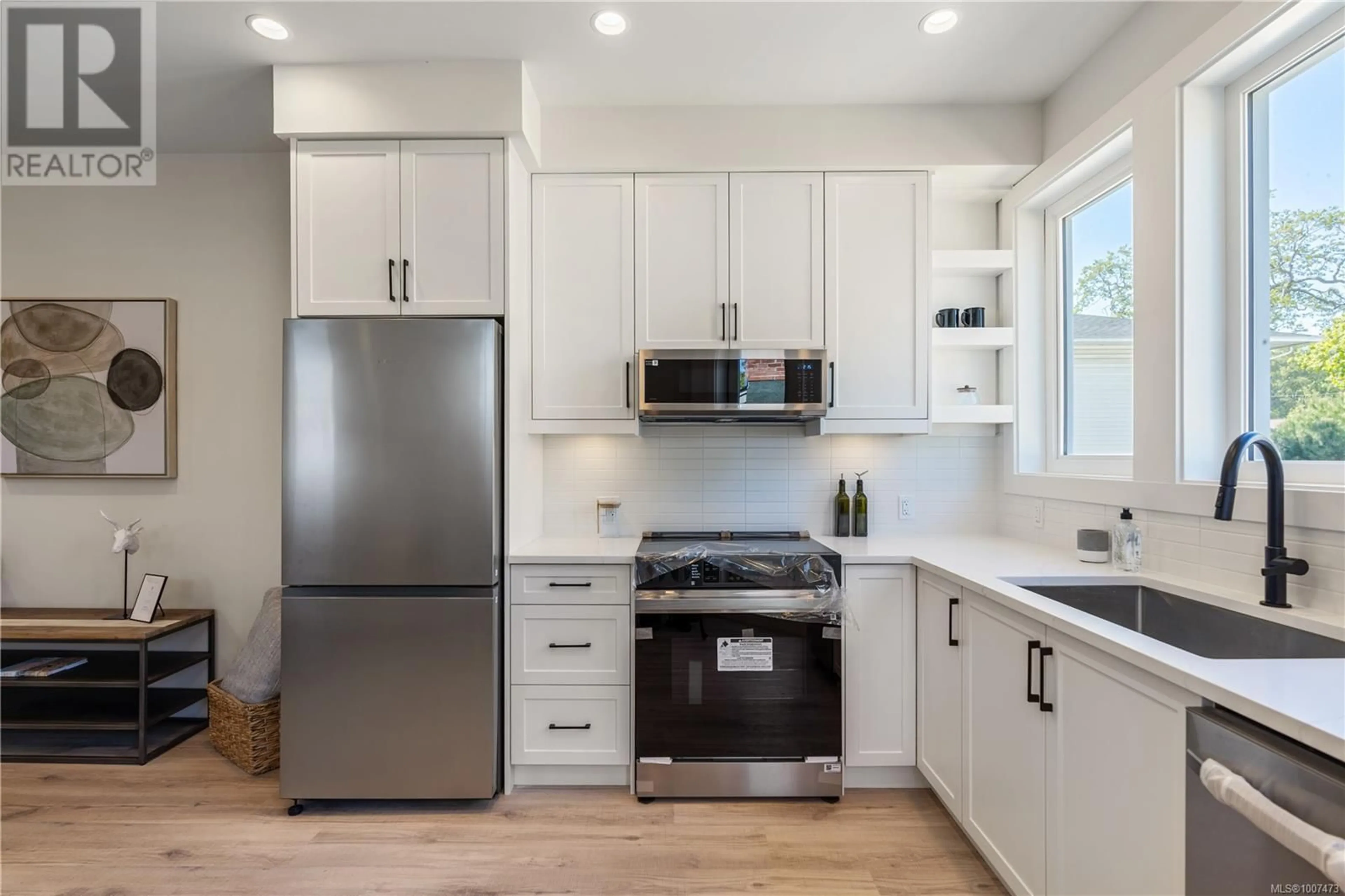 Open concept kitchen, unknown for 1 - 910 OLD ESQUIMALT ROAD, Esquimalt British Columbia V9A4X3