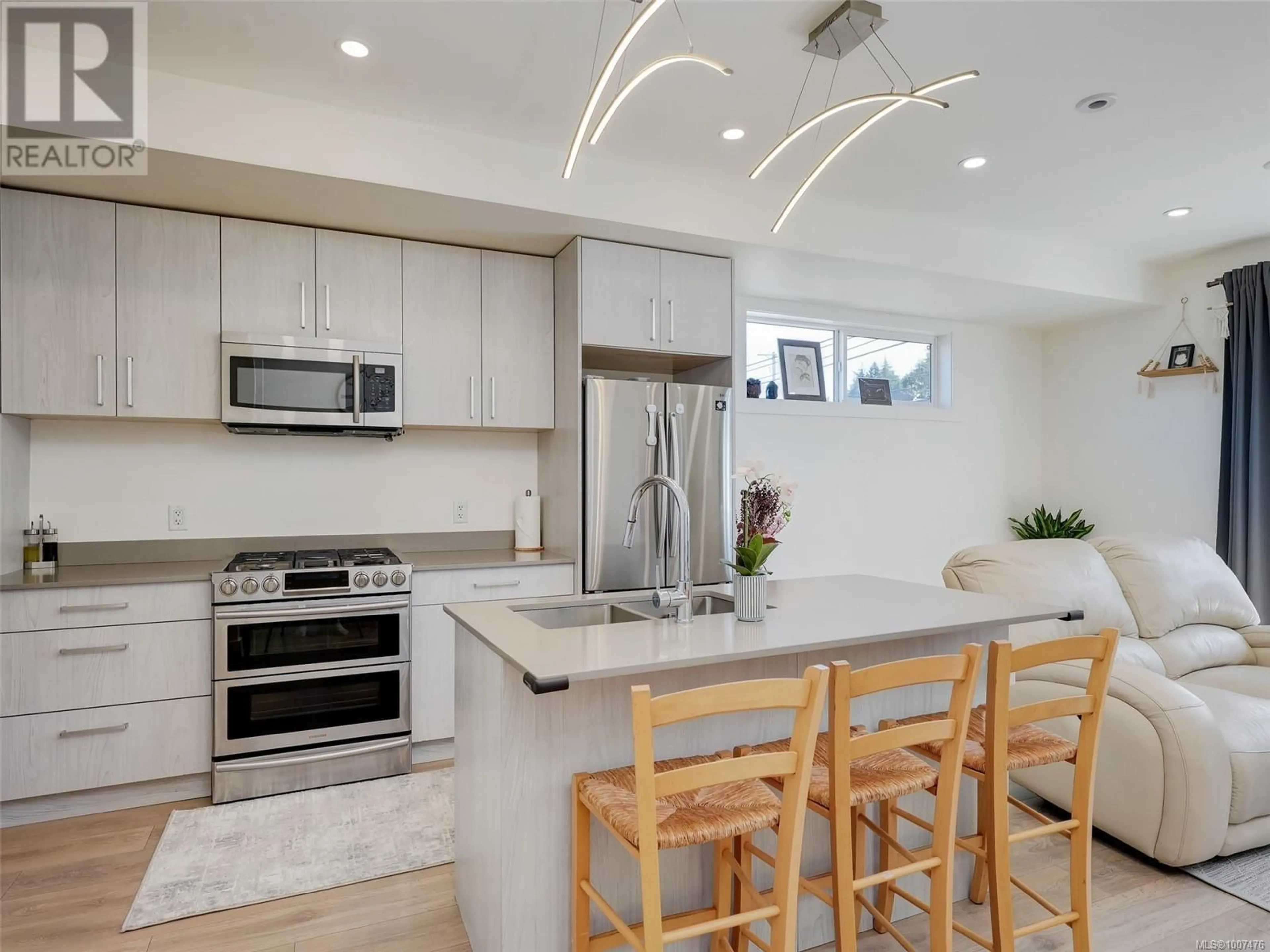 Contemporary kitchen, ceramic/tile floor for 103 - 3331 RADIANT WAY, Langford British Columbia V9C0N4