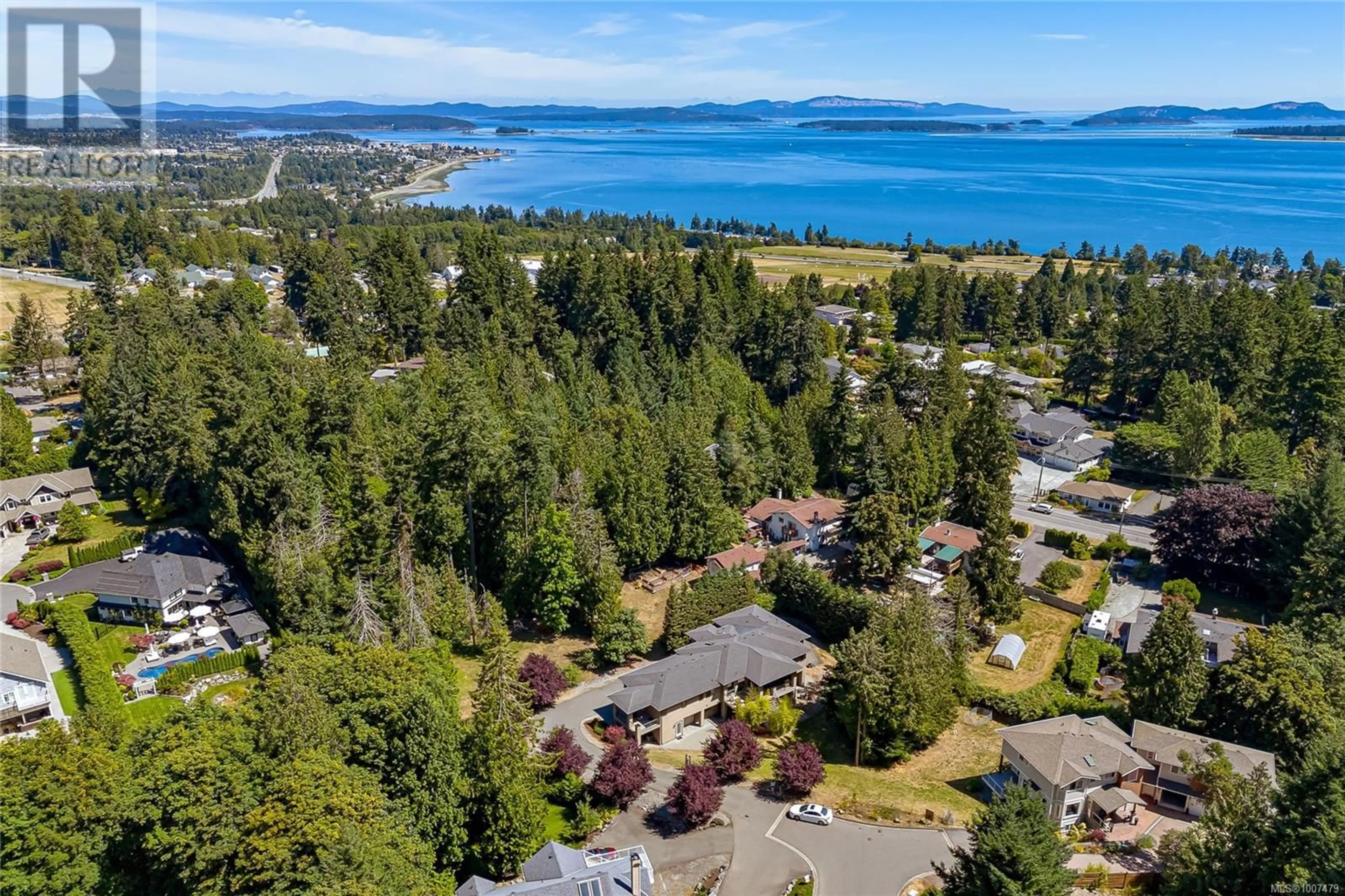 A pic from outside/outdoor area/front of a property/back of a property/a pic from drone, water/lake/river/ocean view for 1954 BARRETT DRIVE, North Saanich British Columbia V8L1A3