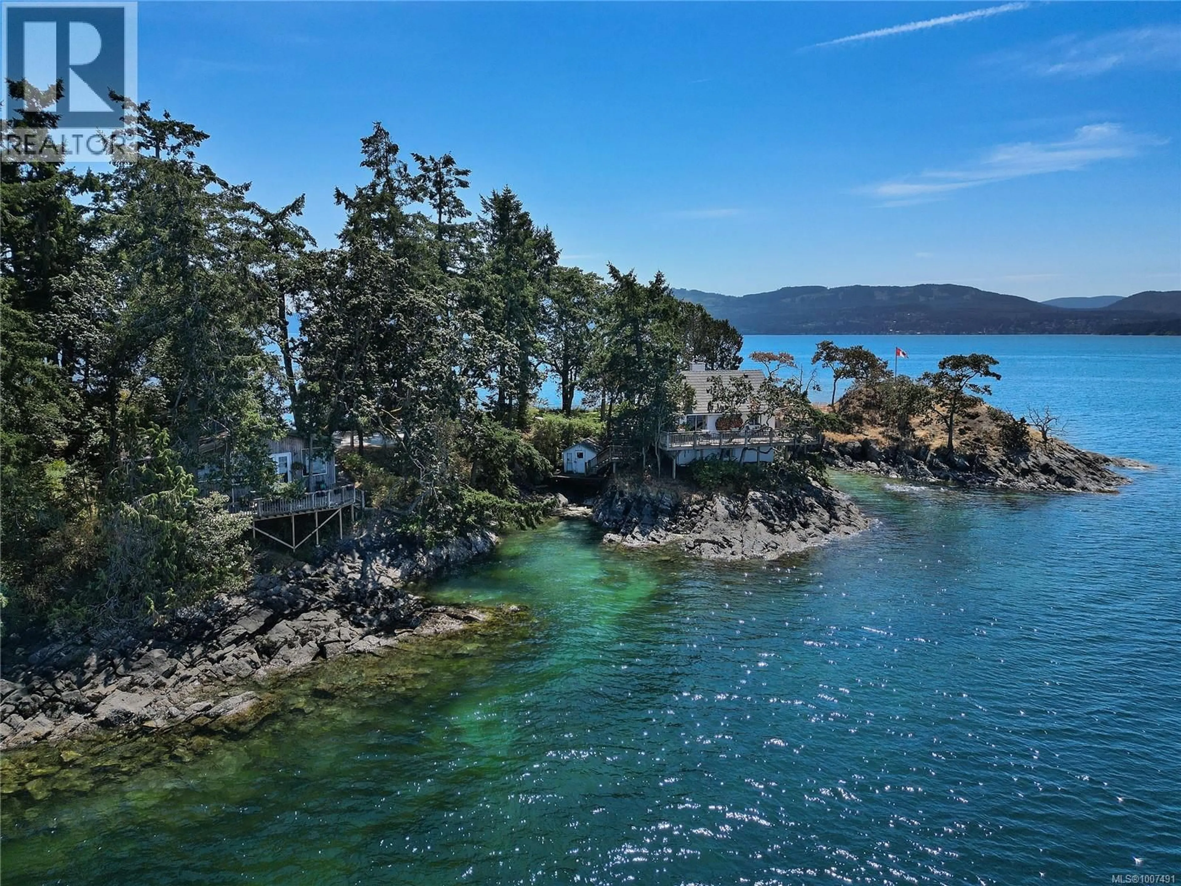 A pic from outside/outdoor area/front of a property/back of a property/a pic from drone, water/lake/river/ocean view for 273 COAL POINT LANE, North Saanich British Columbia V8L5P1