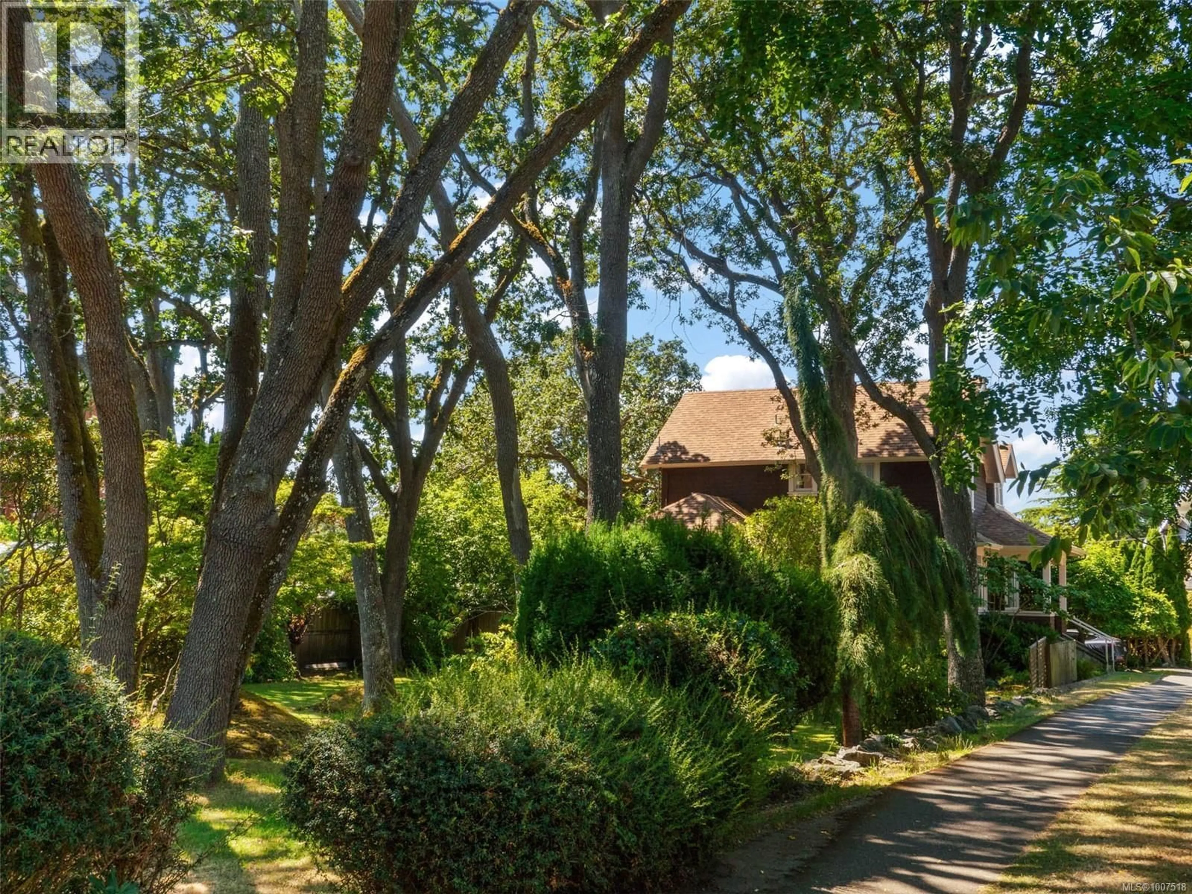 A pic from outside/outdoor area/front of a property/back of a property/a pic from drone, street for 1353 CRAIGDARROCH ROAD, Victoria British Columbia V8S2A6