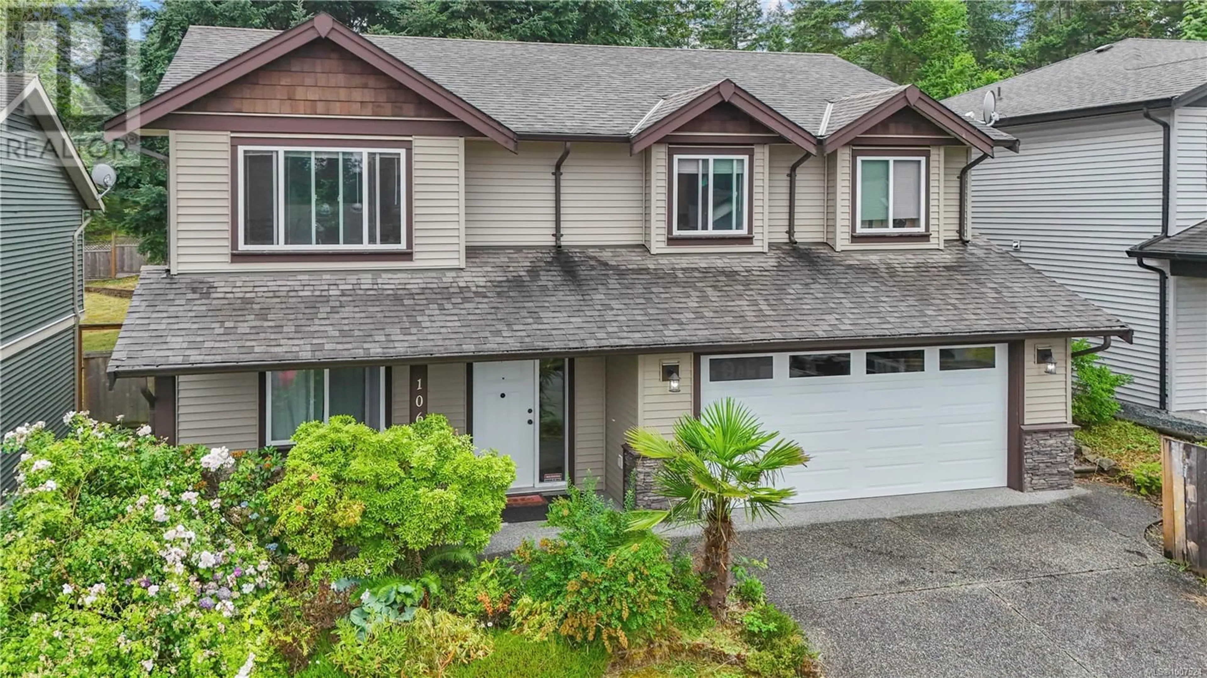 Home with vinyl exterior material, street for 1069 SOUTHWOOD DRIVE, Nanaimo British Columbia V9R0B2
