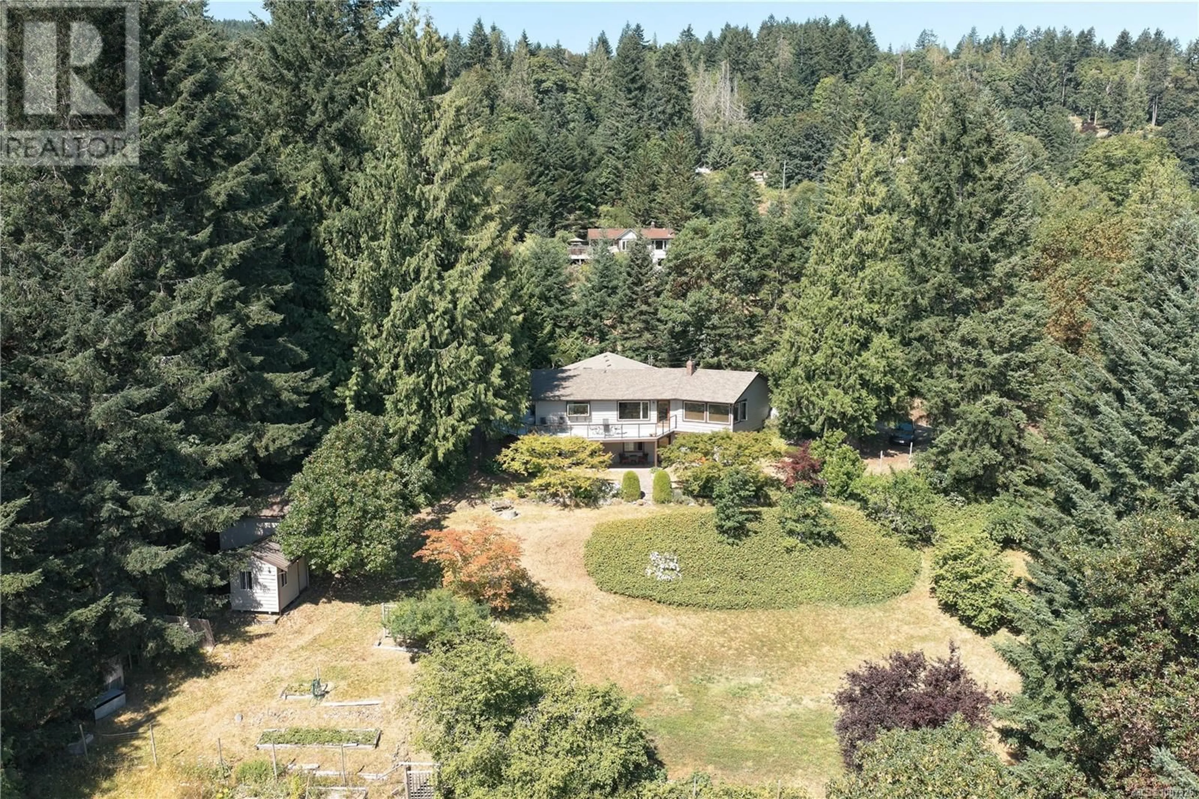 A pic from outside/outdoor area/front of a property/back of a property/a pic from drone, forest/trees view for 435 DUKES ROAD, Salt Spring British Columbia V8K2B5