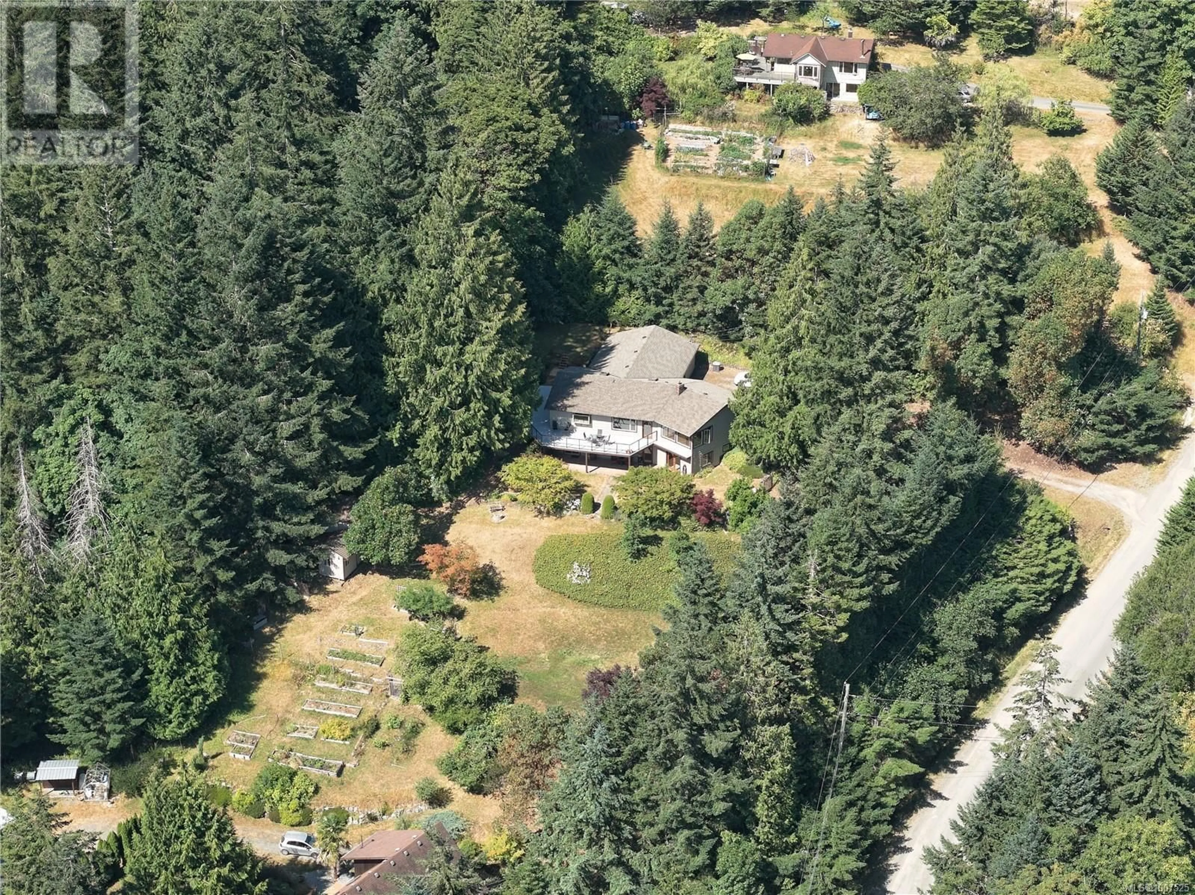 A pic from outside/outdoor area/front of a property/back of a property/a pic from drone, forest/trees view for 435 DUKES ROAD, Salt Spring British Columbia V8K2B5