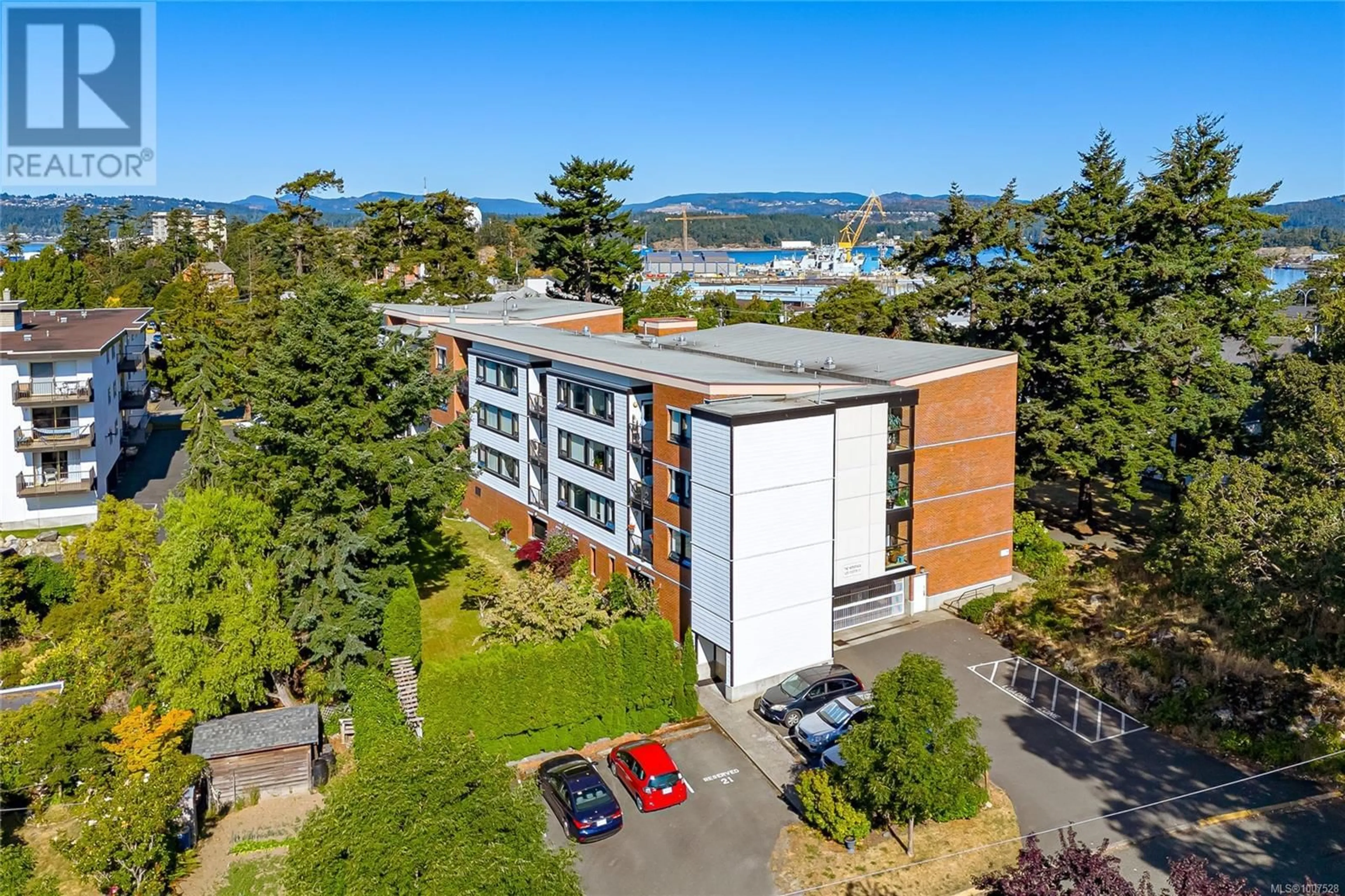 A pic from outside/outdoor area/front of a property/back of a property/a pic from drone, water/lake/river/ocean view for 205 - 520 FOSTER STREET, Esquimalt British Columbia V9A3R4
