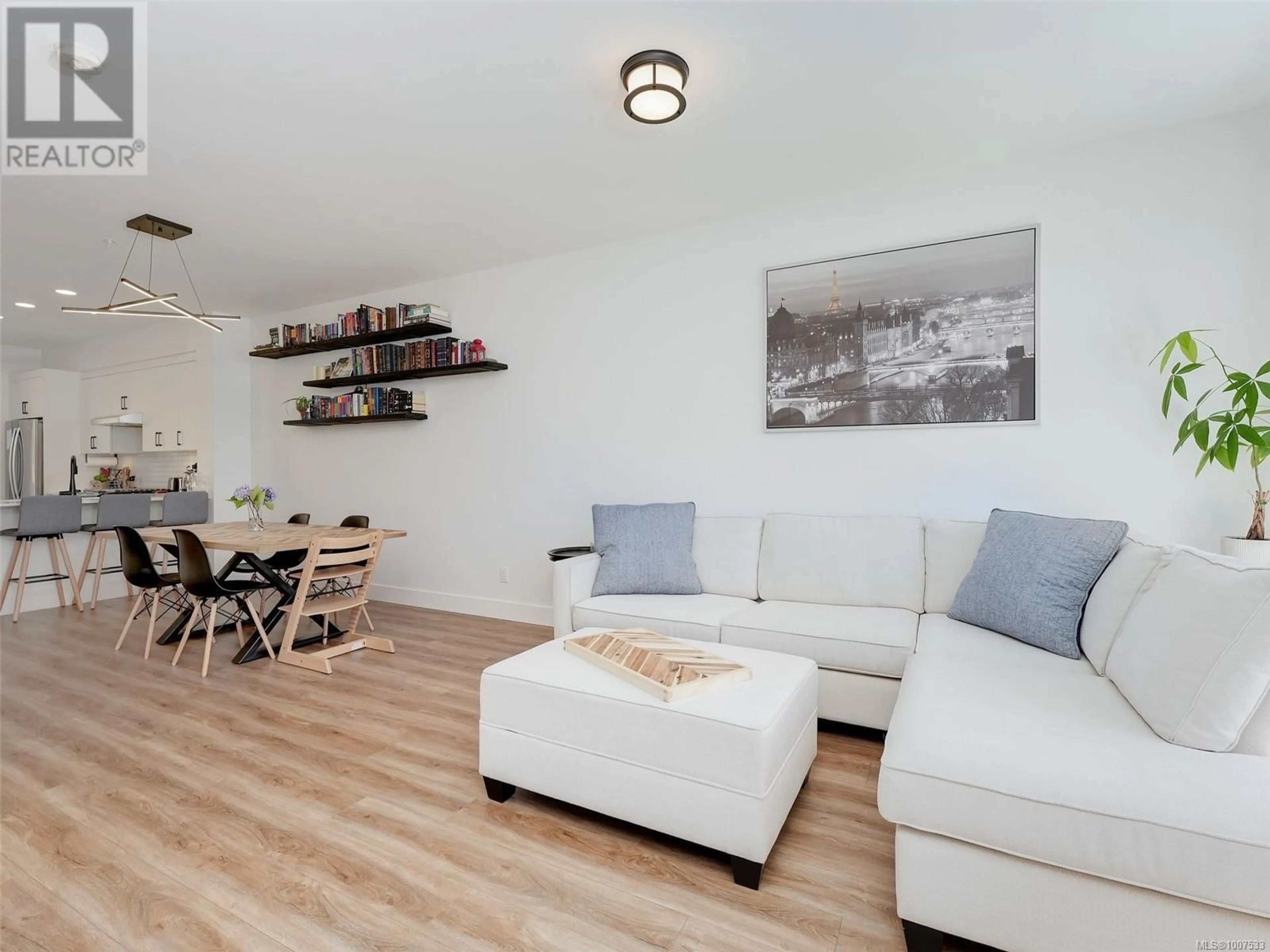 Living room with furniture, wood/laminate floor for 21 - 255 CASPIAN DRIVE, Colwood British Columbia V9C0R9
