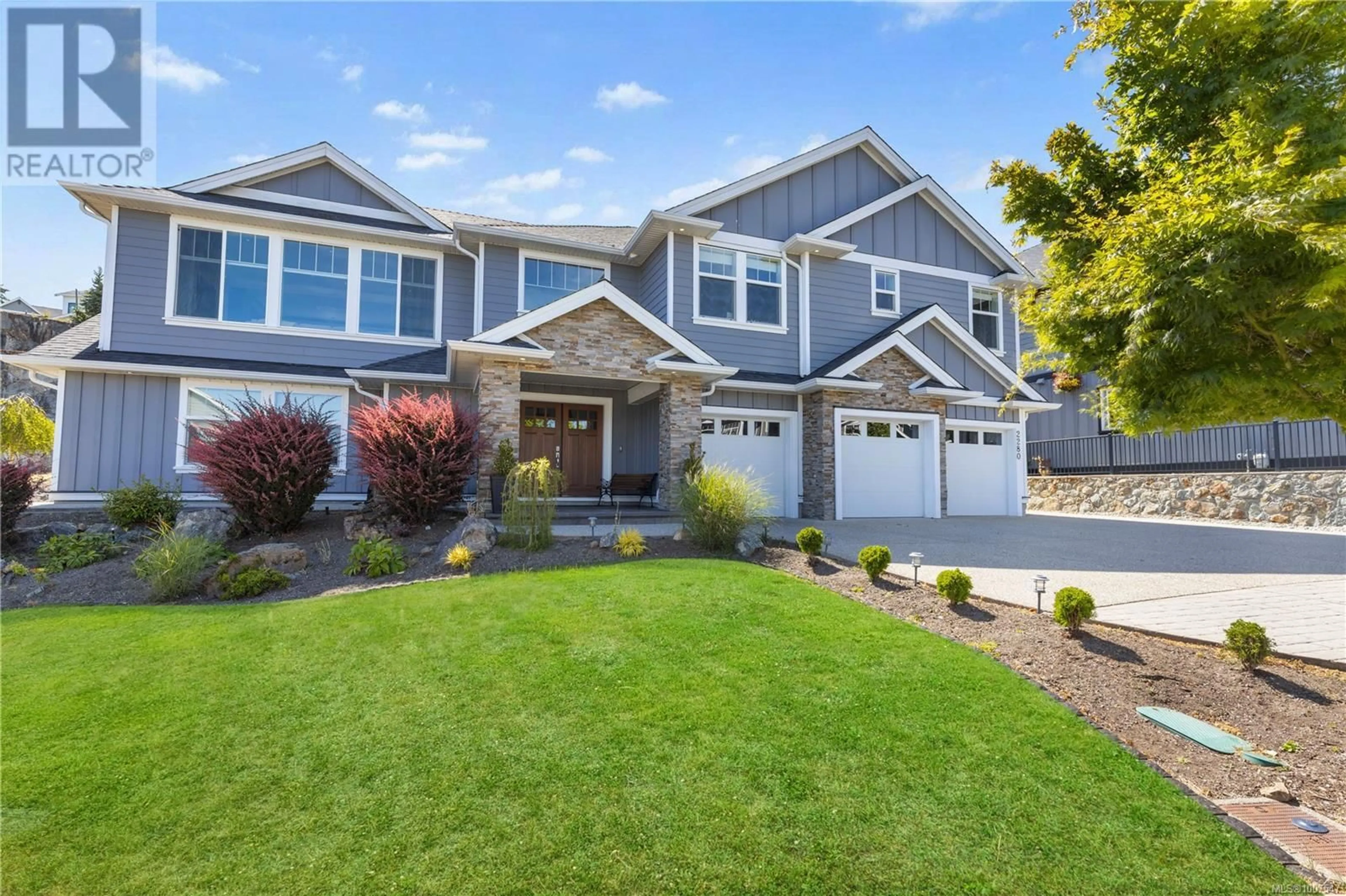 Home with vinyl exterior material, street for 2280 NICKLAUS DRIVE, Langford British Columbia V9B0L2