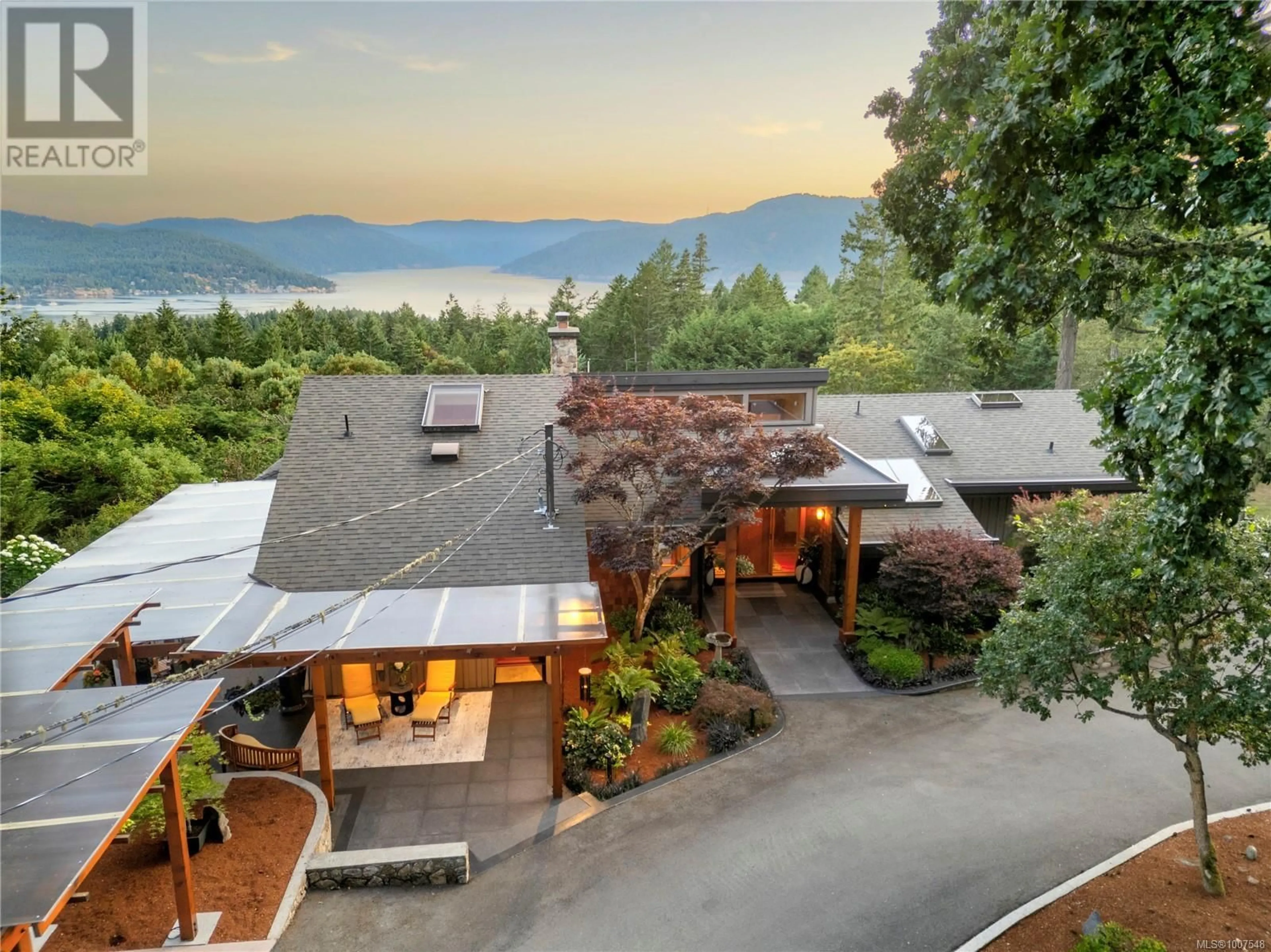 A pic from outside/outdoor area/front of a property/back of a property/a pic from drone, mountain view for 8100 WOODWYN TERRACE, Central Saanich British Columbia V8M1S2