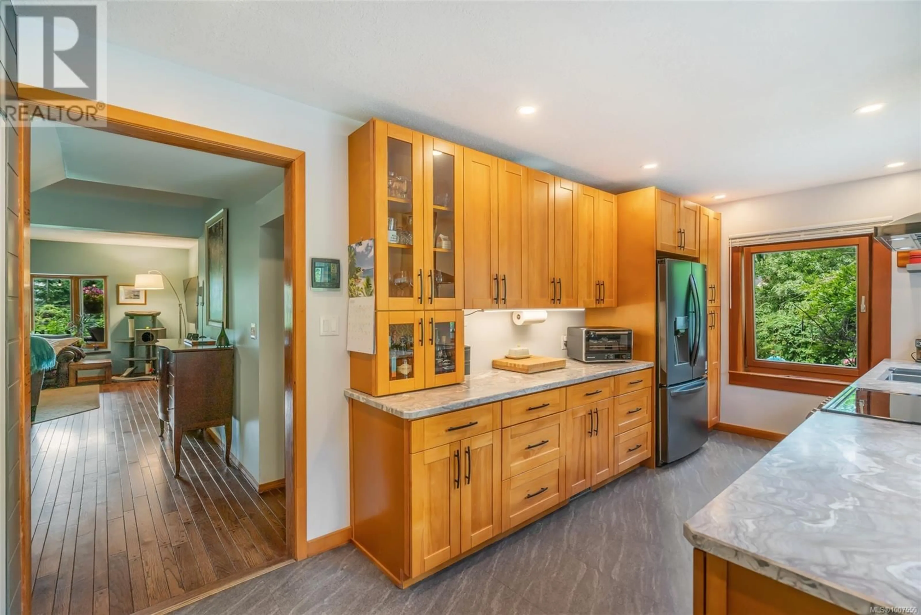 Open concept kitchen, wood/laminate floor for 4287 SHELL BEACH ROAD, Ladysmith British Columbia V9G1M8