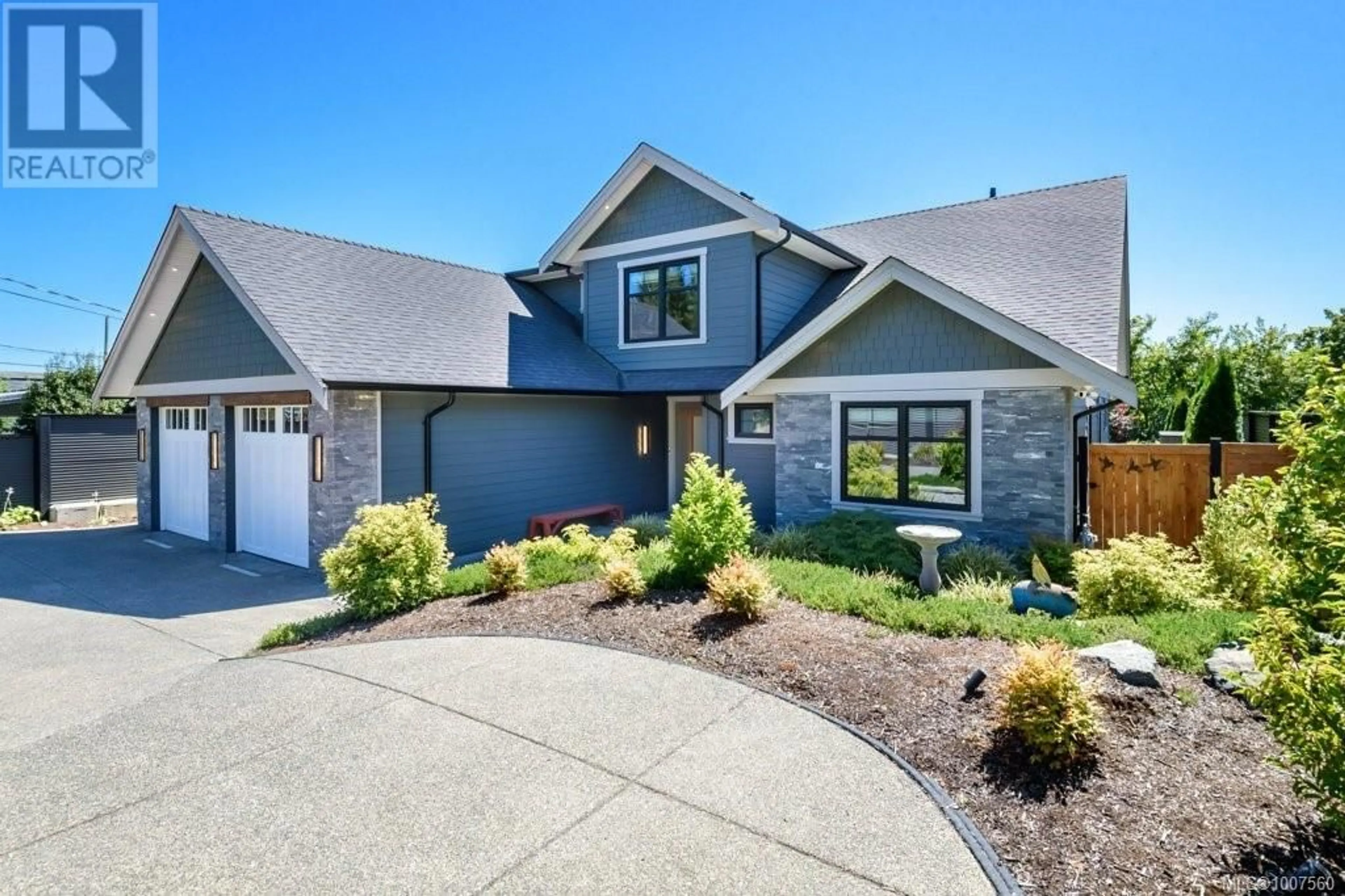 Home with brick exterior material, street for 1891 COMOX AVENUE, Comox British Columbia V9M3M4