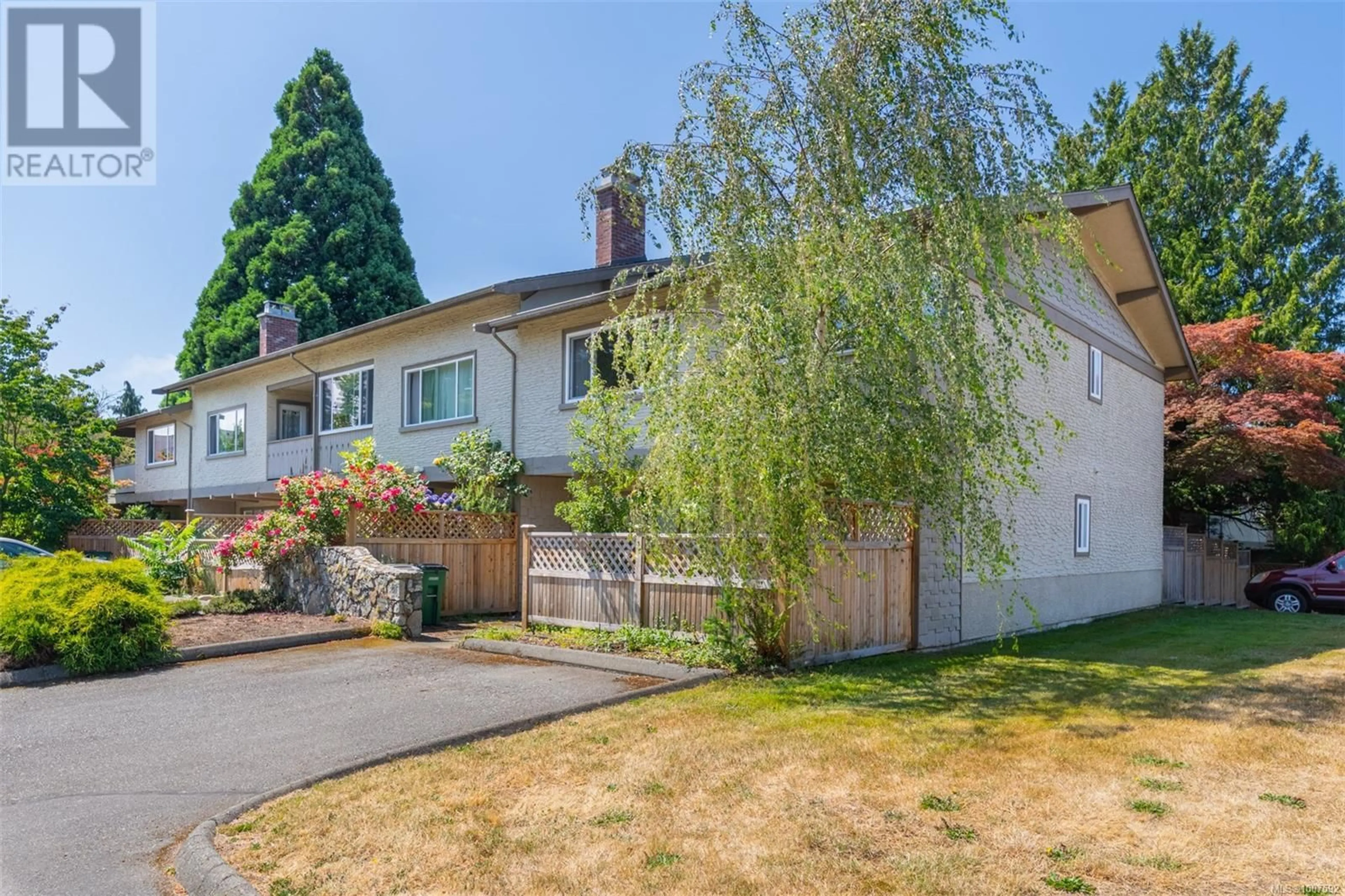 A pic from outside/outdoor area/front of a property/back of a property/a pic from drone, street for 14 - 1705 FELTHAM ROAD, Saanich British Columbia V8N2A4