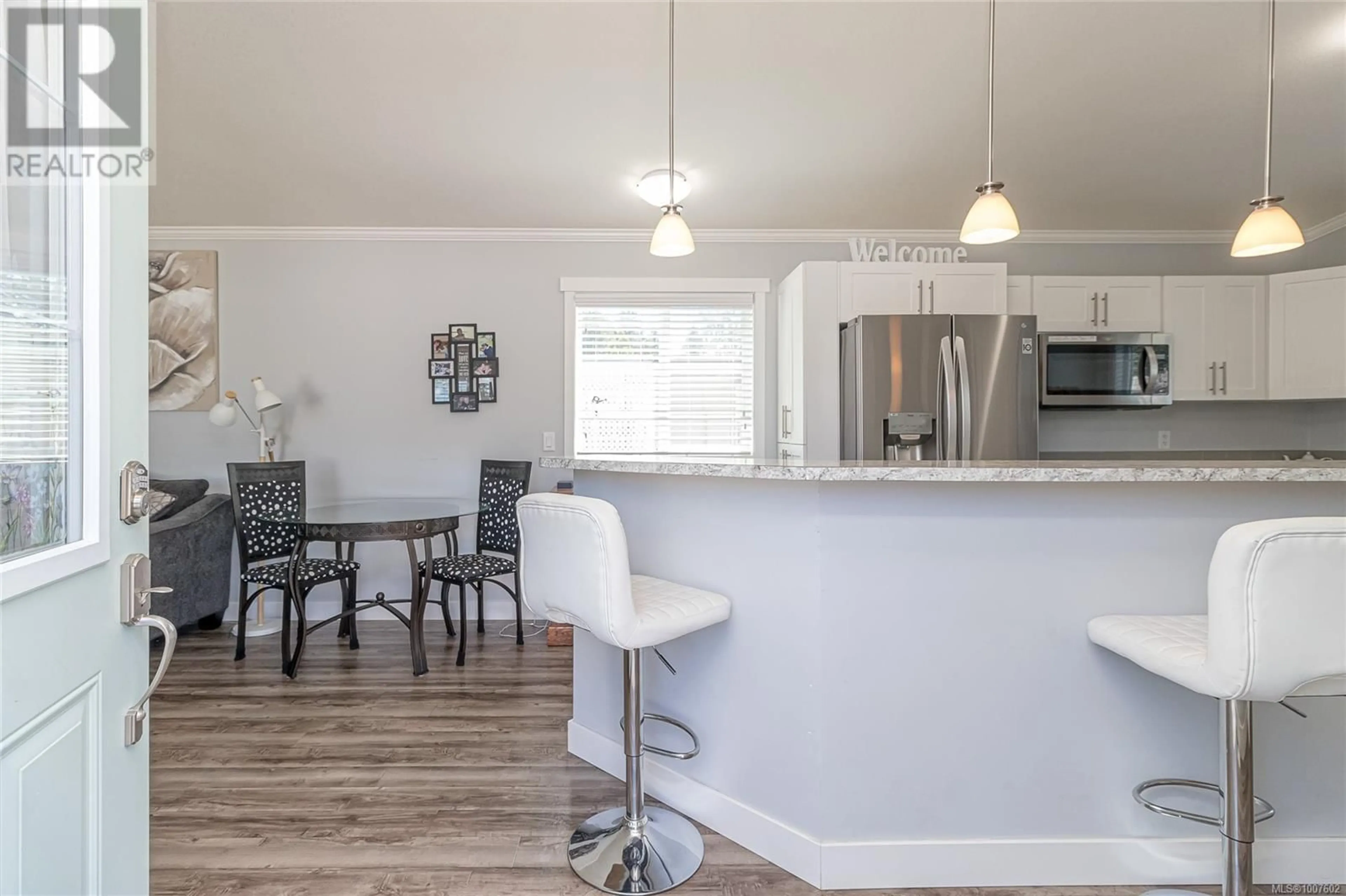 Open concept kitchen, wood/laminate floor for 36 - 3497 GIBBINS ROAD, Duncan British Columbia V9L6C9