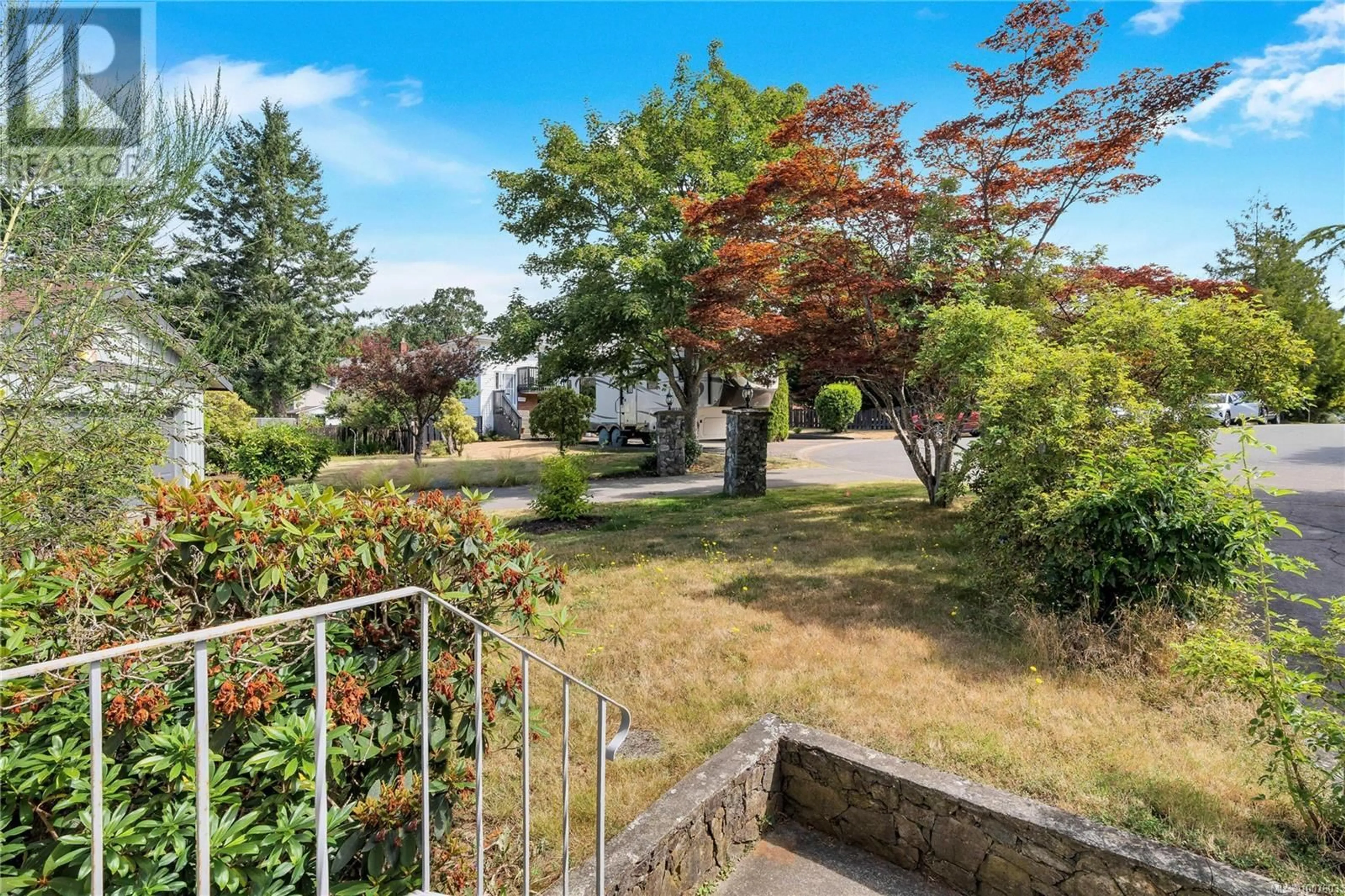 A pic from outside/outdoor area/front of a property/back of a property/a pic from drone, street for 1587 JUDOBA PLACE, Saanich British Columbia V8X5V4