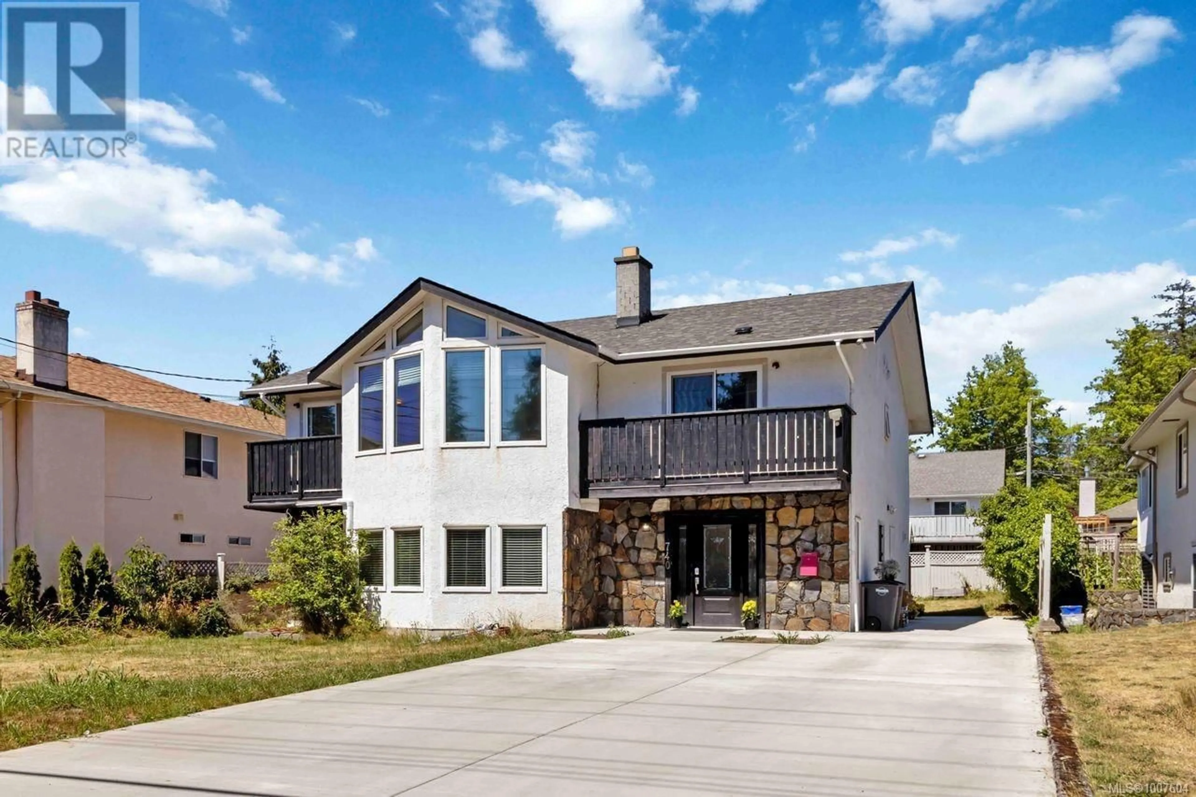 Home with brick exterior material, unknown for 740 MANN AVENUE, Saanich British Columbia V8Z3C2