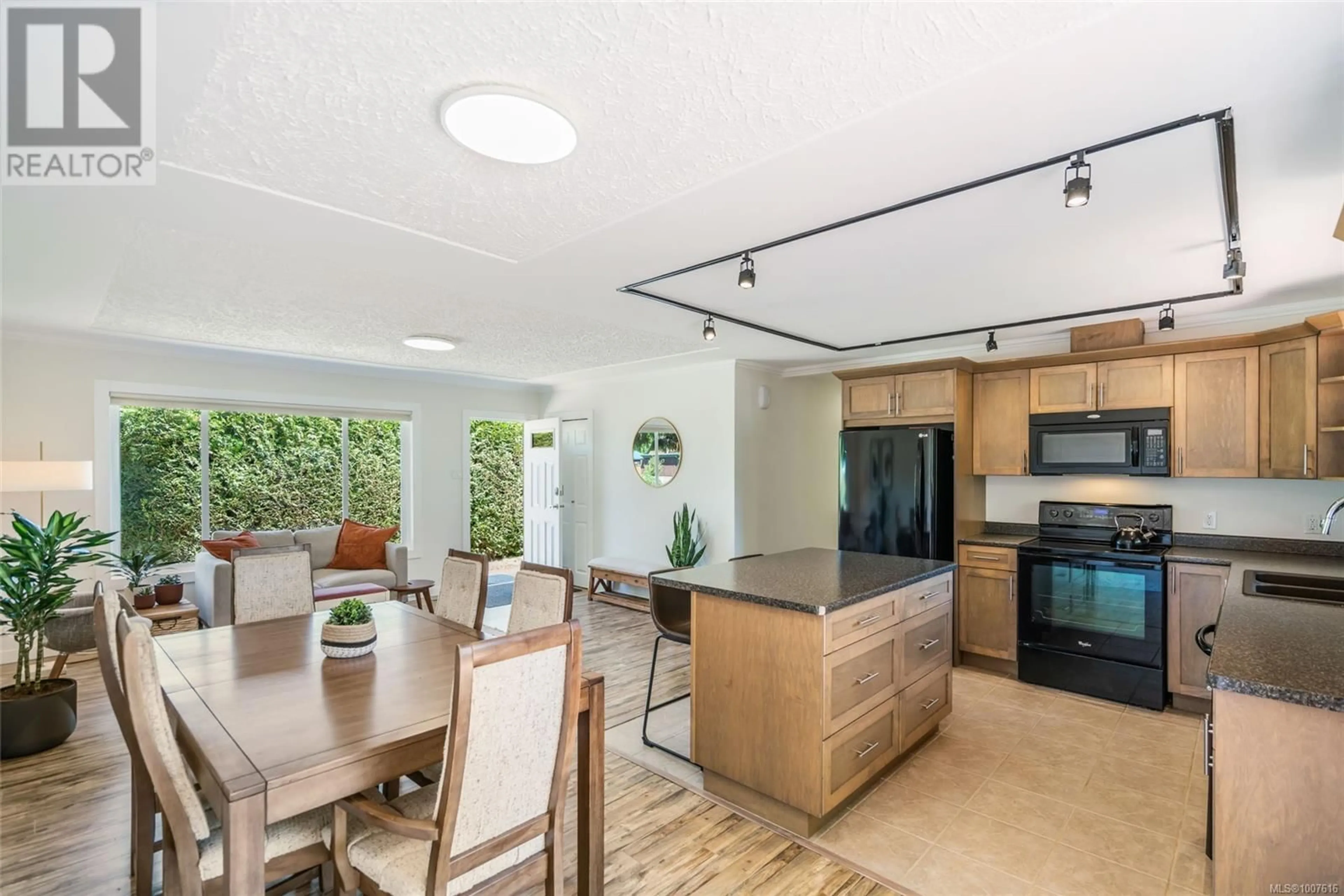 Open concept kitchen, ceramic/tile floor for 2135 WILLEMAR AVENUE, Courtenay British Columbia V9N3M7