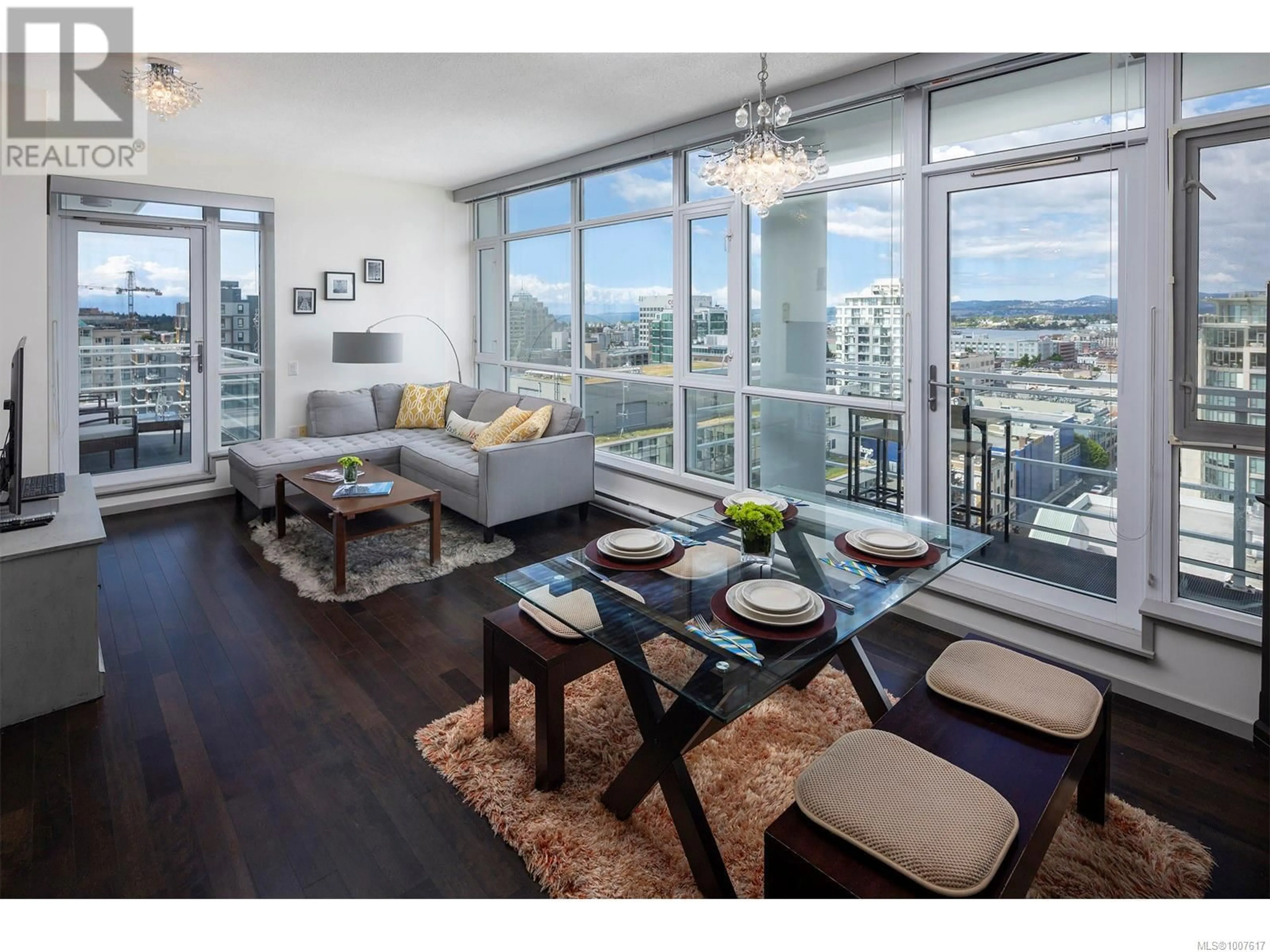 Living room with furniture, wood/laminate floor for 1502 - 834 JOHNSON STREET, Victoria British Columbia V8W1N3