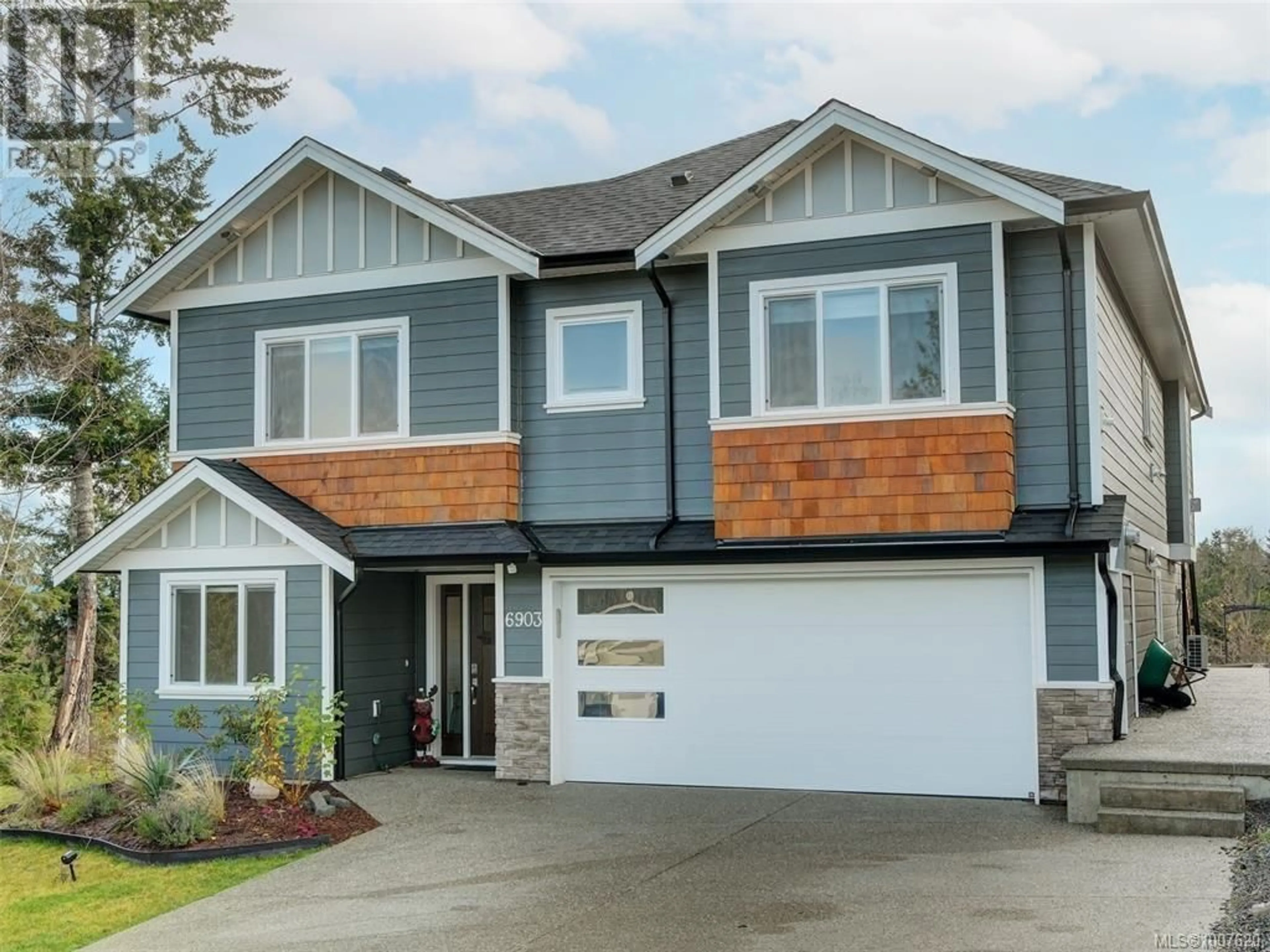 Home with vinyl exterior material, street for 6903 BURR DRIVE, Sooke British Columbia V9Z0L1