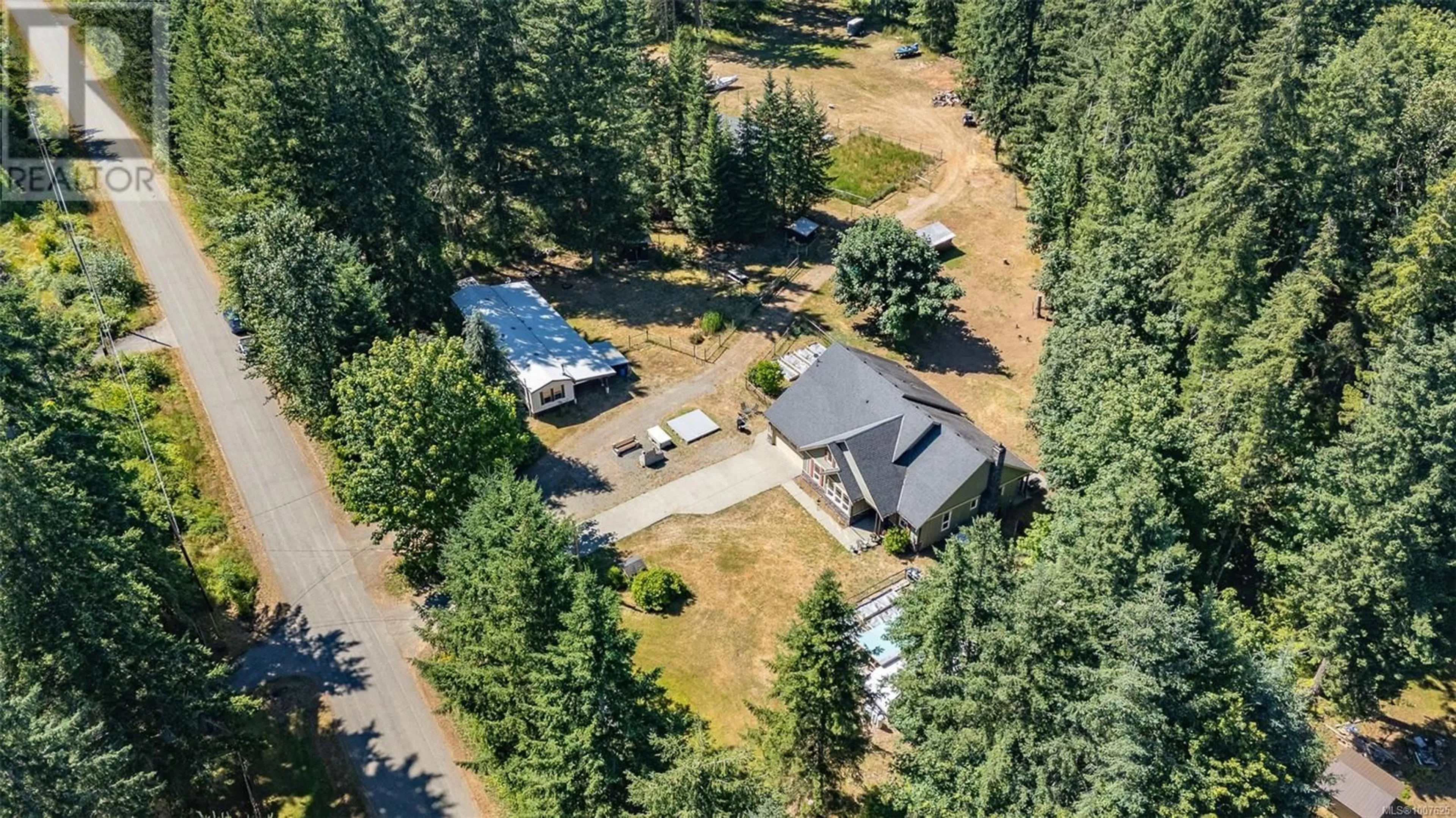 A pic from outside/outdoor area/front of a property/back of a property/a pic from drone, unknown for 3476/3470 HEATHER ROAD, Black Creek British Columbia V9J1E5
