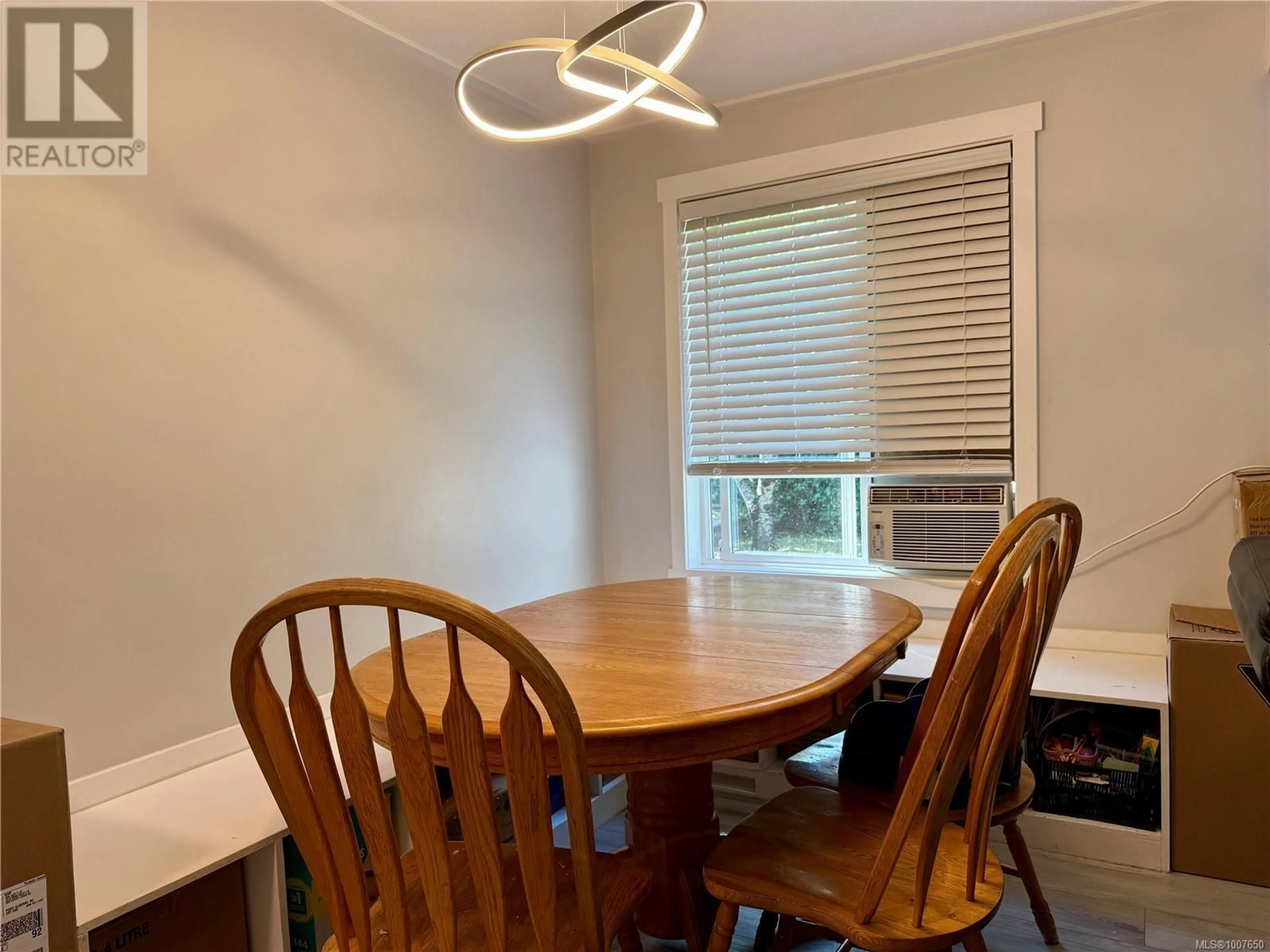 Dining room, wood/laminate floor for 4021 8TH AVENUE, Port Alberni British Columbia V9Y4S3