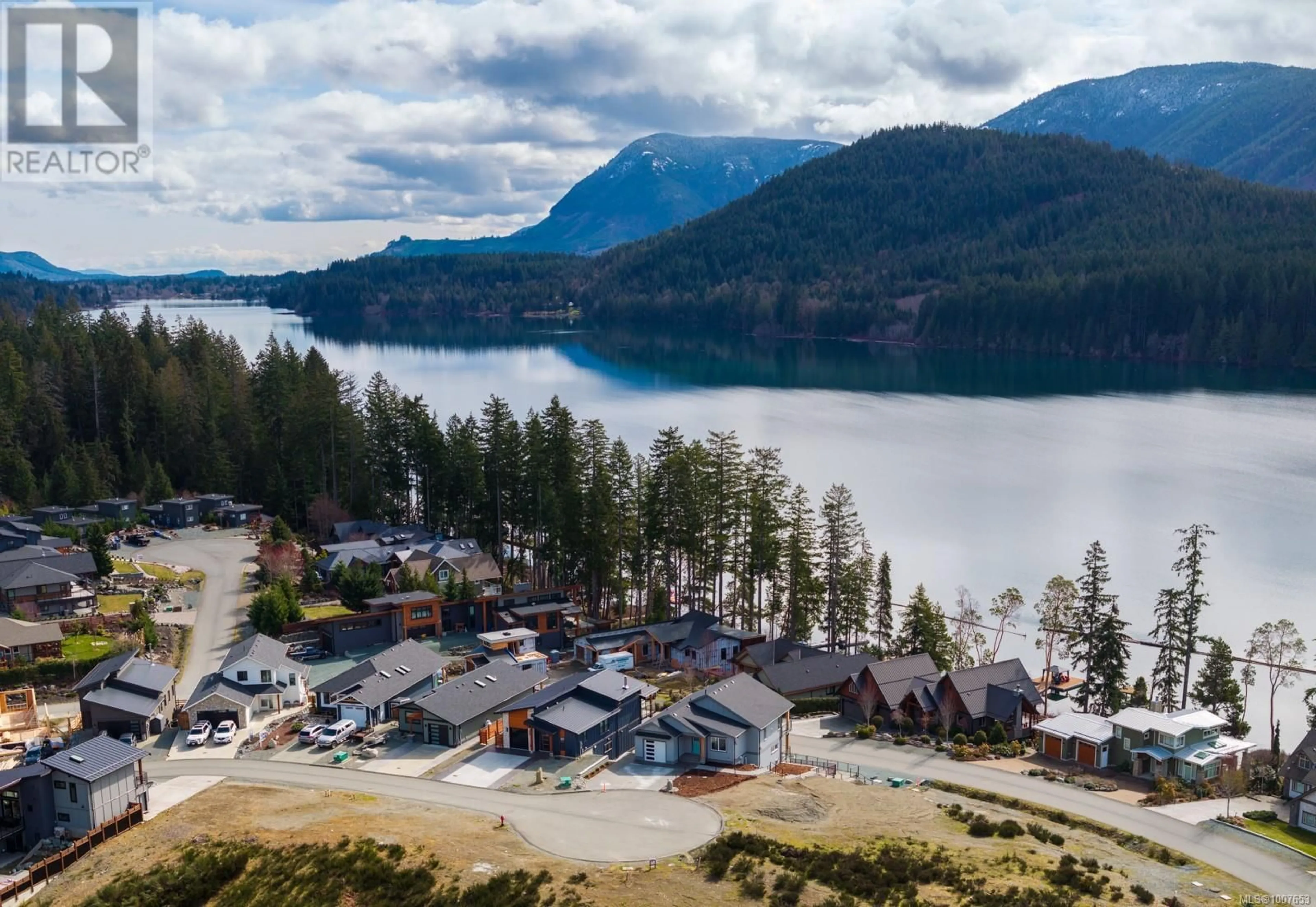 A pic from outside/outdoor area/front of a property/back of a property/a pic from drone, water/lake/river/ocean view for 9394 LAKEFRONT RISE, Lake Cowichan British Columbia V0R2G1