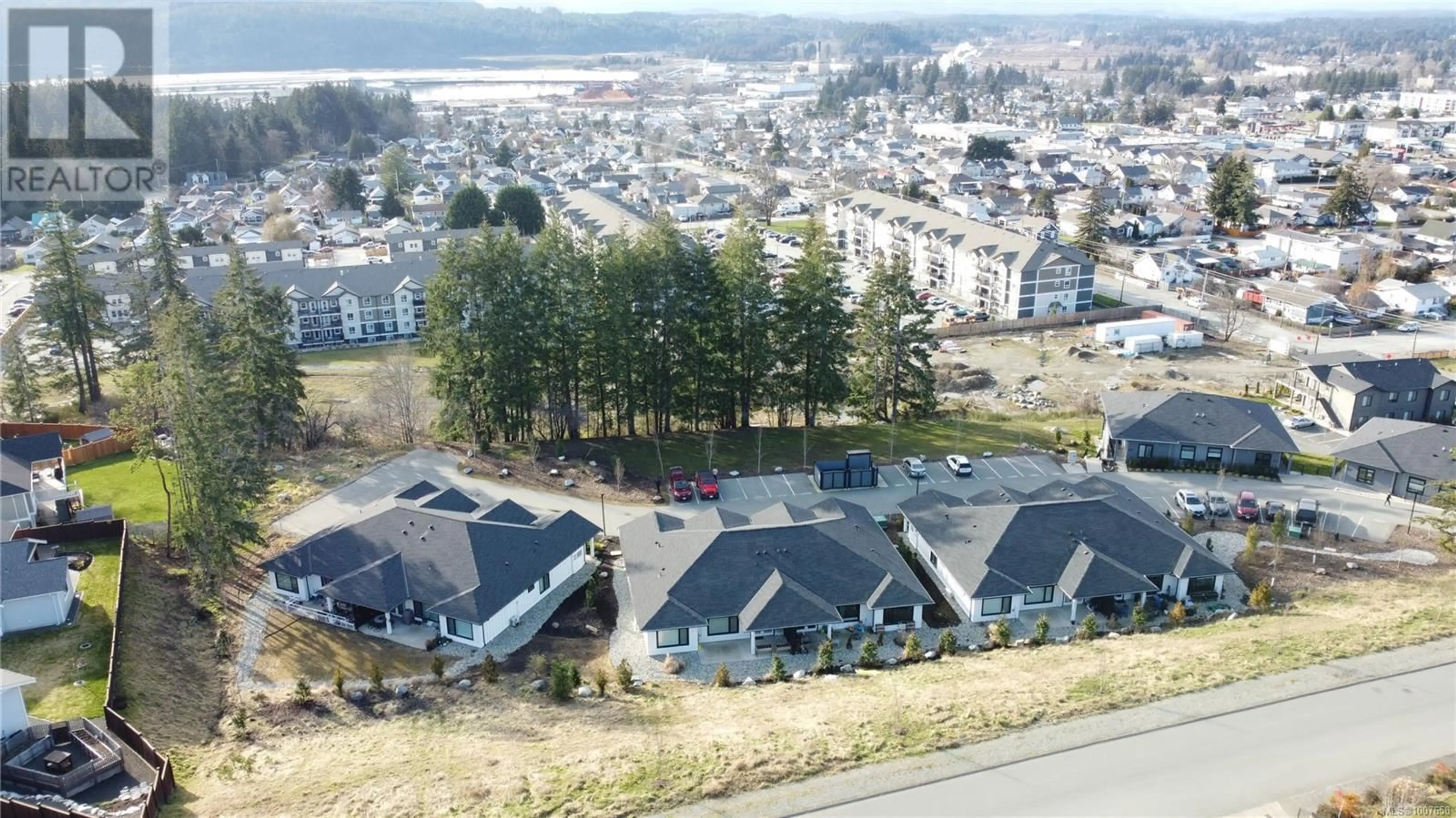 A pic from outside/outdoor area/front of a property/back of a property/a pic from drone, mountain view for 103-B - 3590 16TH AVENUE, Port Alberni British Columbia V9Y7L9