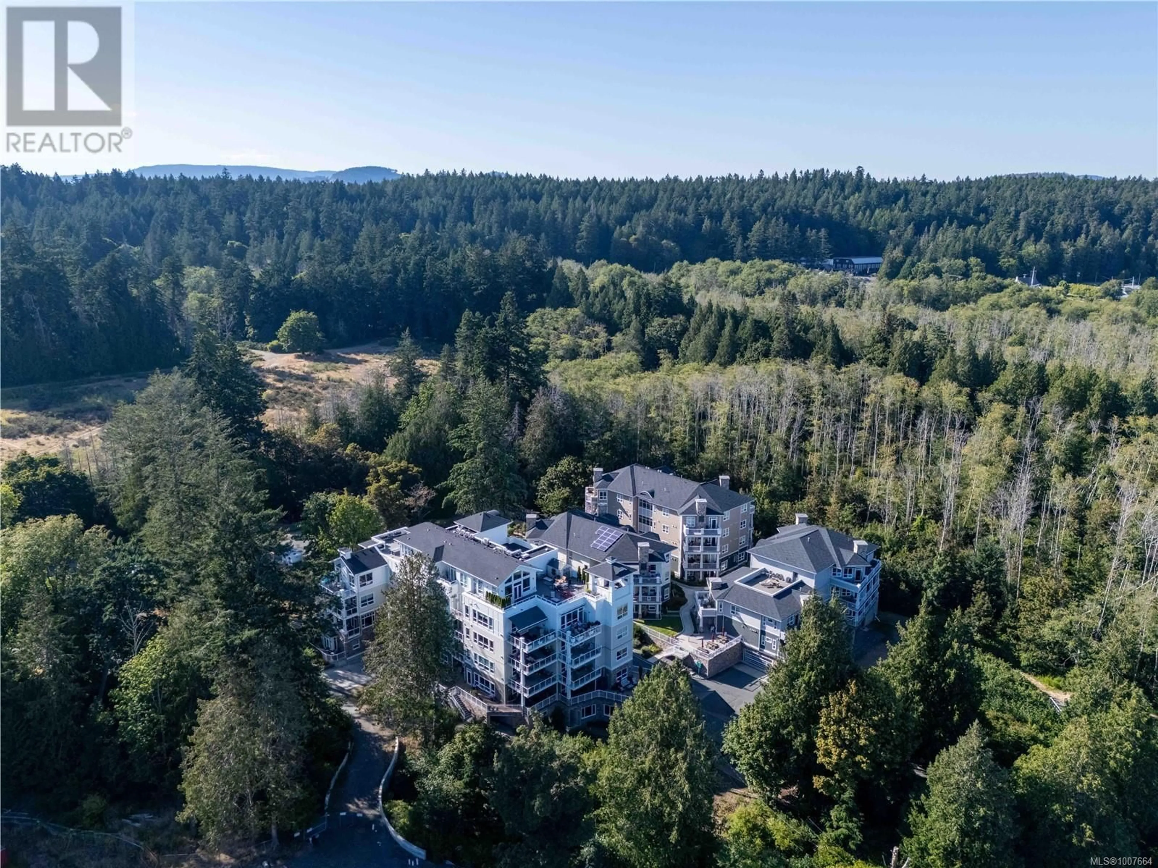 A pic from outside/outdoor area/front of a property/back of a property/a pic from drone, forest/trees view for 104 - 3111C HAVENWOOD LANE, Colwood British Columbia V9C0M7