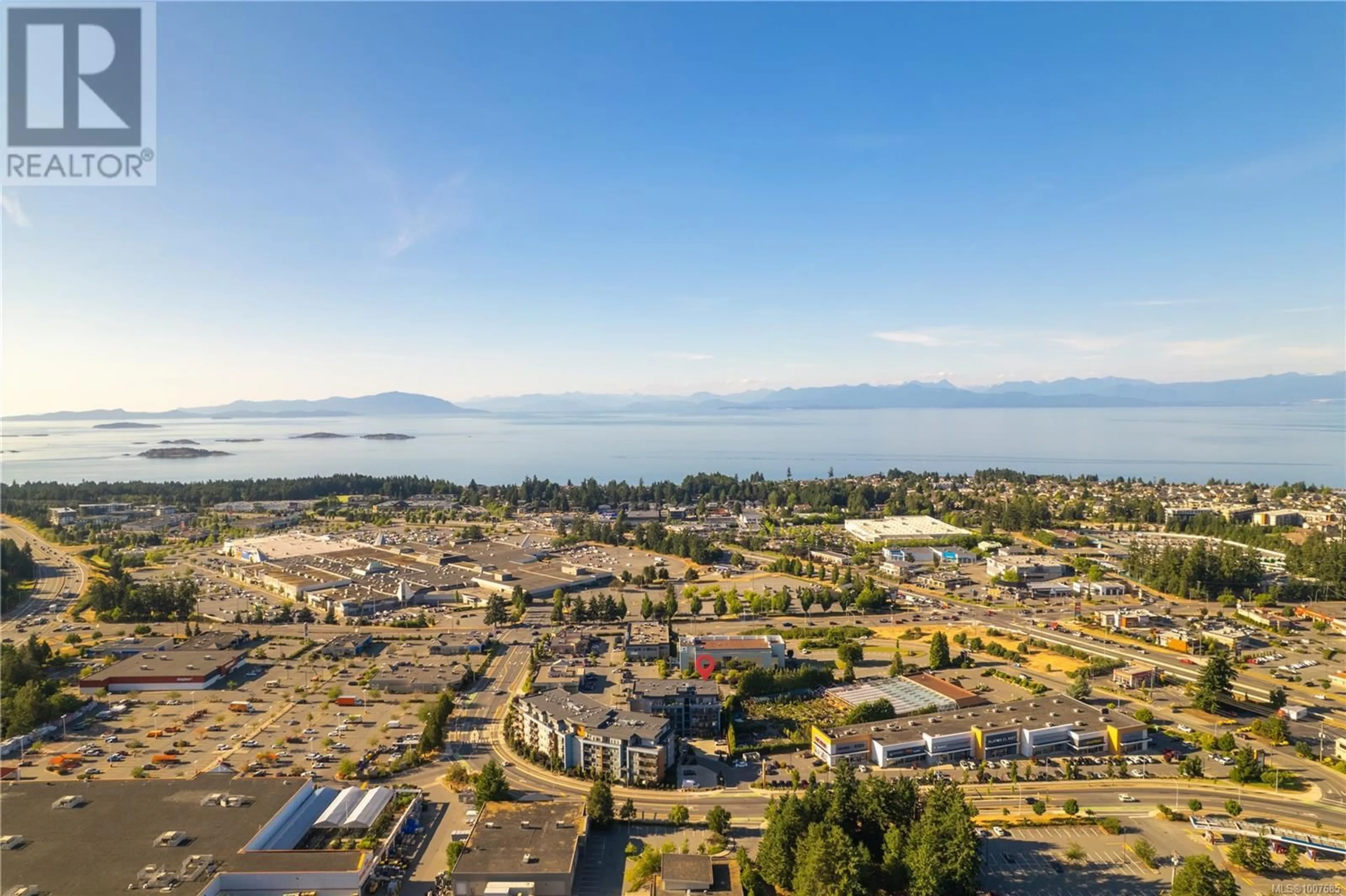 A pic from outside/outdoor area/front of a property/back of a property/a pic from drone, mountain view for 302 - 6544 METRAL DRIVE, Nanaimo British Columbia V9T2L8