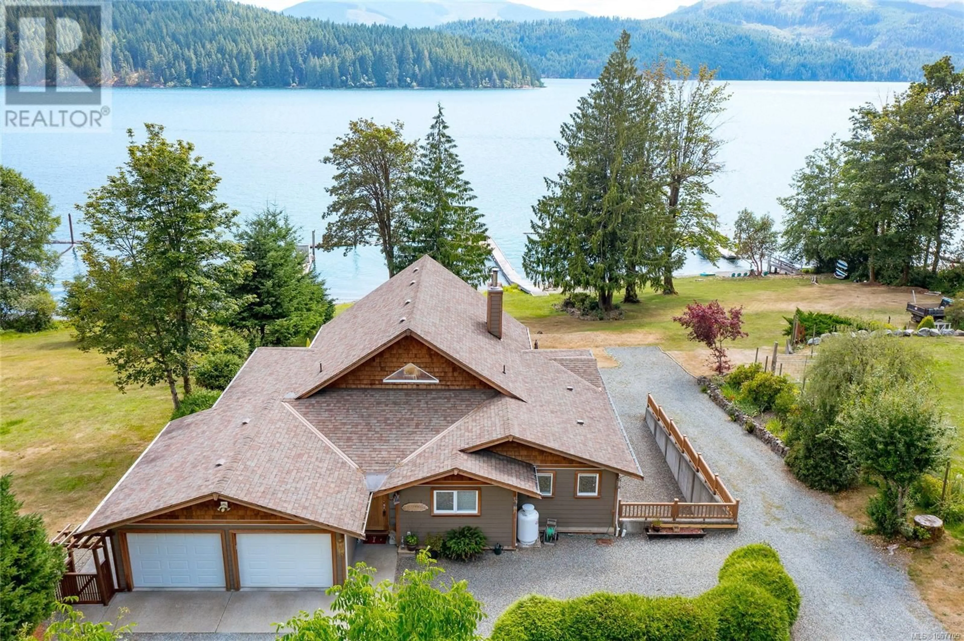 A pic from outside/outdoor area/front of a property/back of a property/a pic from drone, water/lake/river/ocean view for 10146 YOUBOU ROAD, Lake Cowichan British Columbia V0R3E1