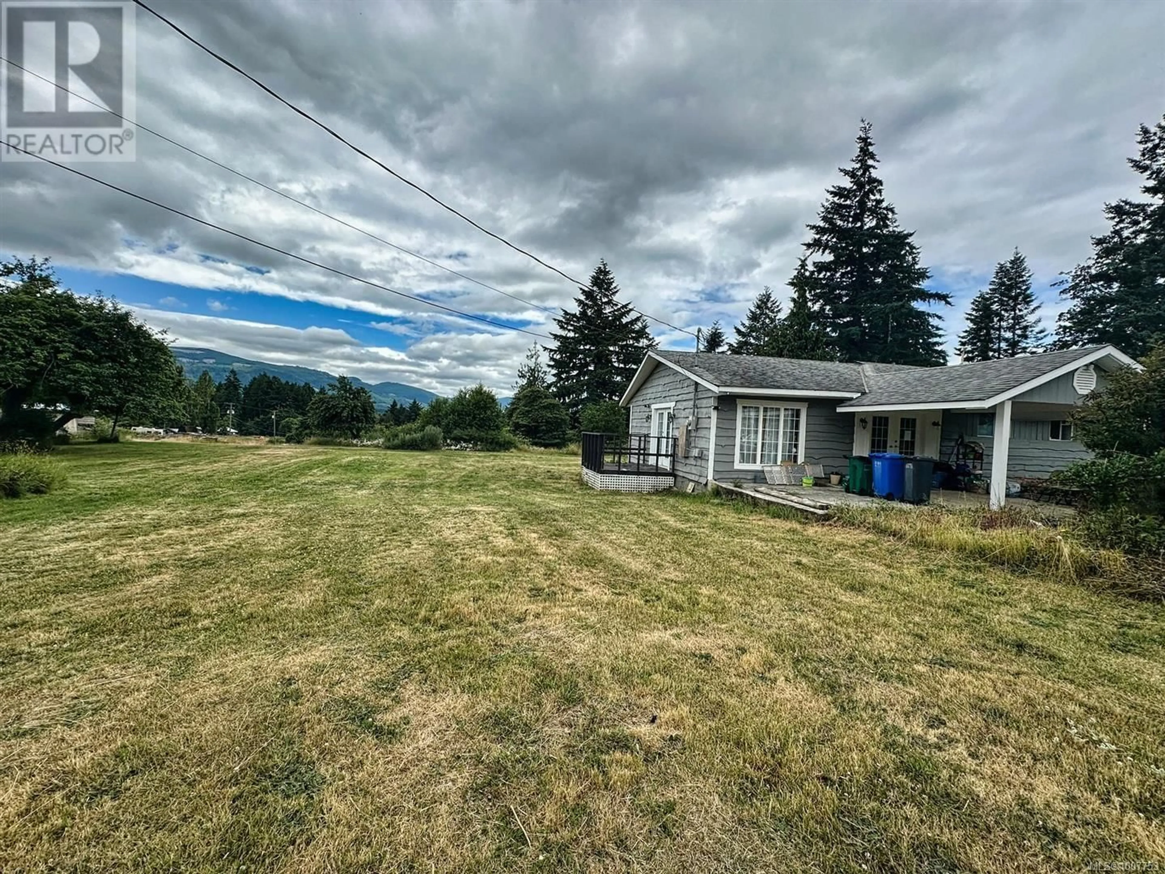 A pic from outside/outdoor area/front of a property/back of a property/a pic from drone, mountain view for 4970 WILSON ROAD, Duncan British Columbia V9L6L5