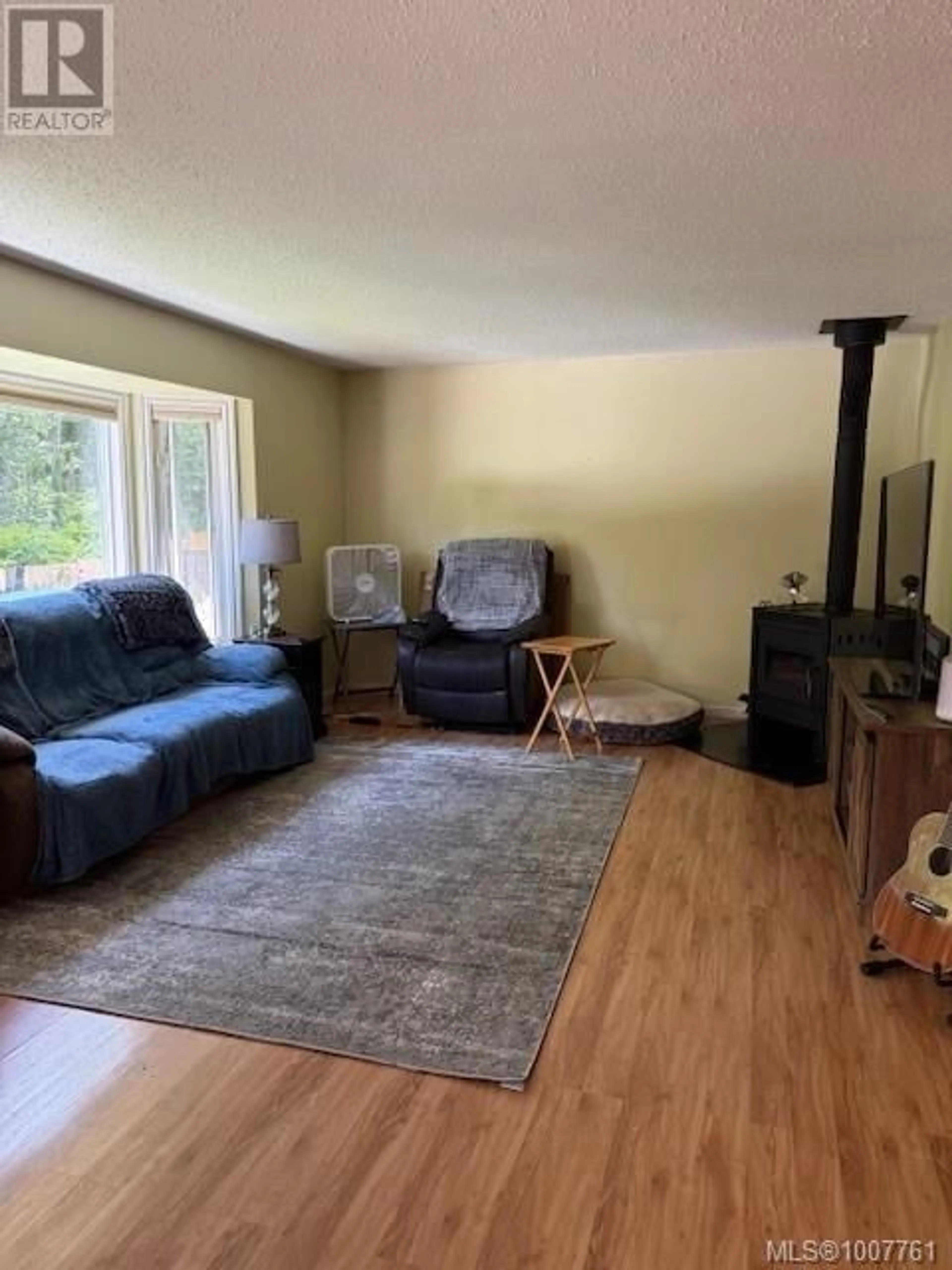 Living room with furniture, unknown for 9415 CARNARVON ROAD, Port Hardy British Columbia V0N2P0