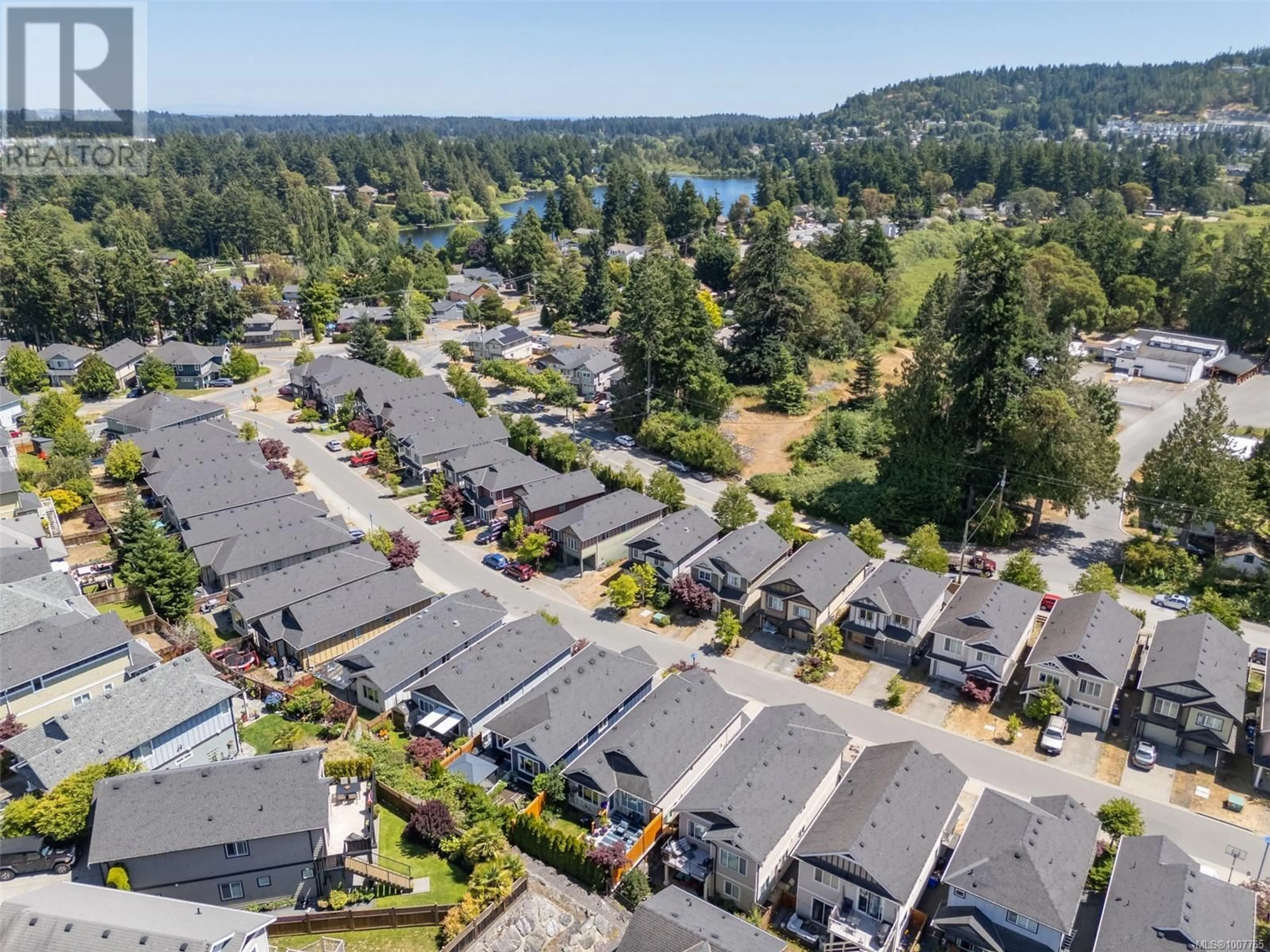 A pic from outside/outdoor area/front of a property/back of a property/a pic from drone, water/lake/river/ocean view for 1250 PARKDALE CREEK GARDENS, Langford British Columbia V9B4G9