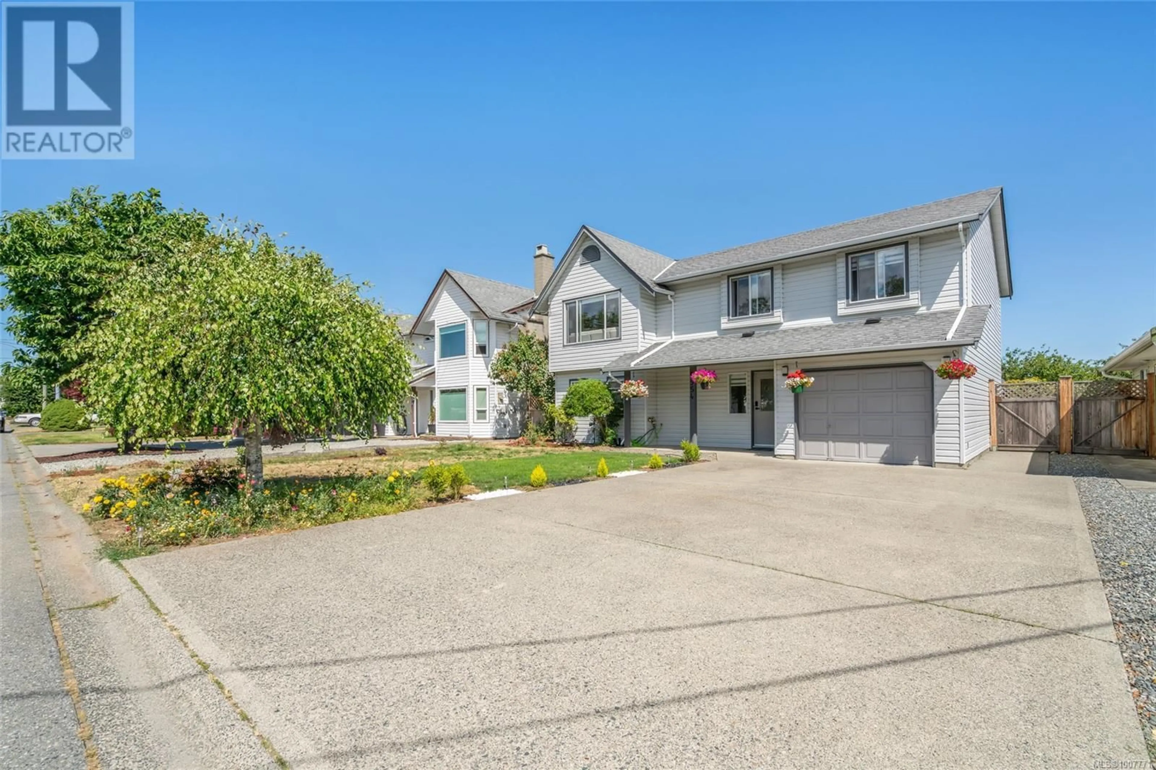 A pic from outside/outdoor area/front of a property/back of a property/a pic from drone, street for 5954 BROADWAY ROAD, Nanaimo British Columbia V9V1C9