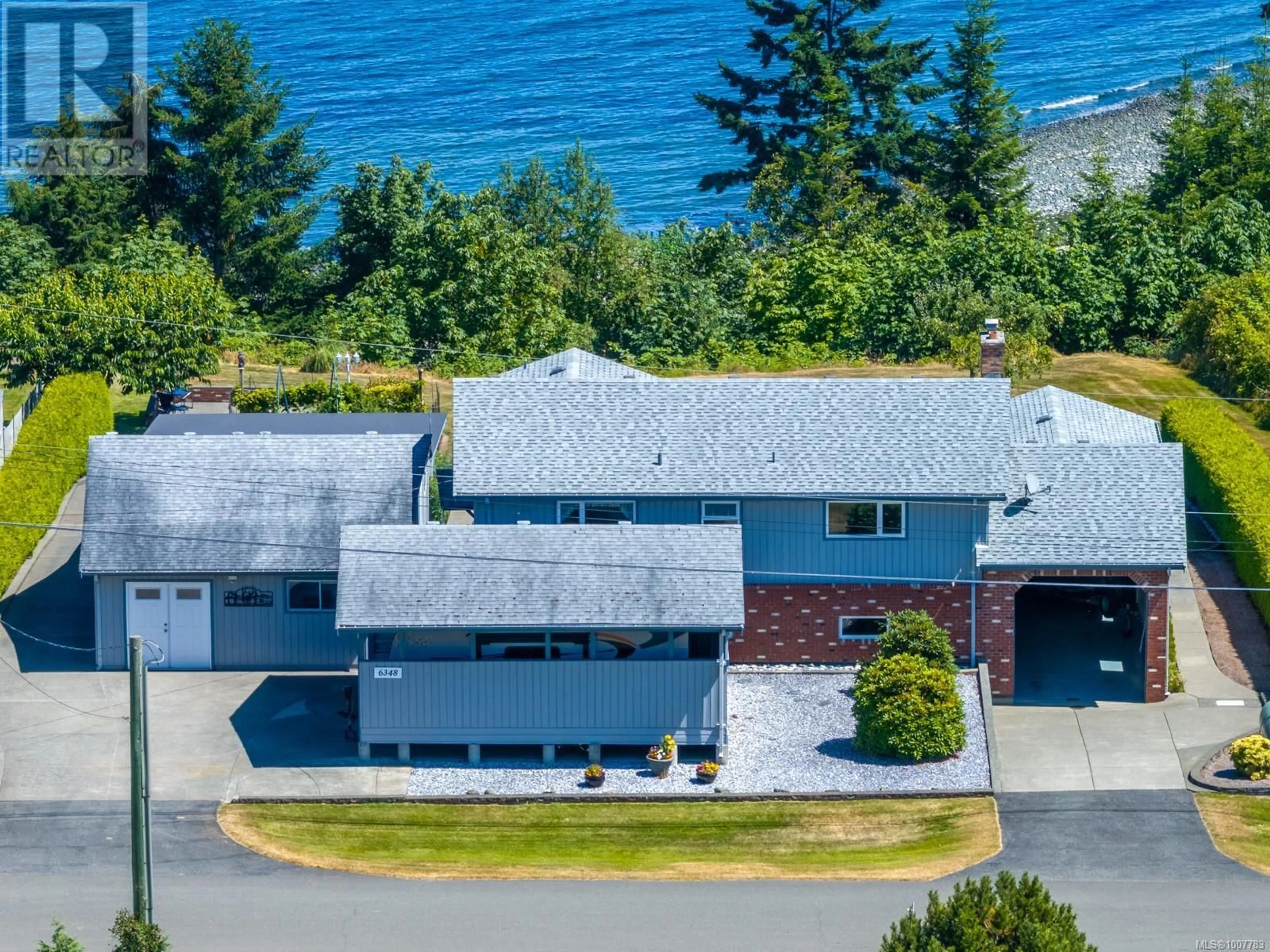A pic from outside/outdoor area/front of a property/back of a property/a pic from drone, water/lake/river/ocean view for 6348 EAGLES DRIVE, Courtenay British Columbia V9J1V4