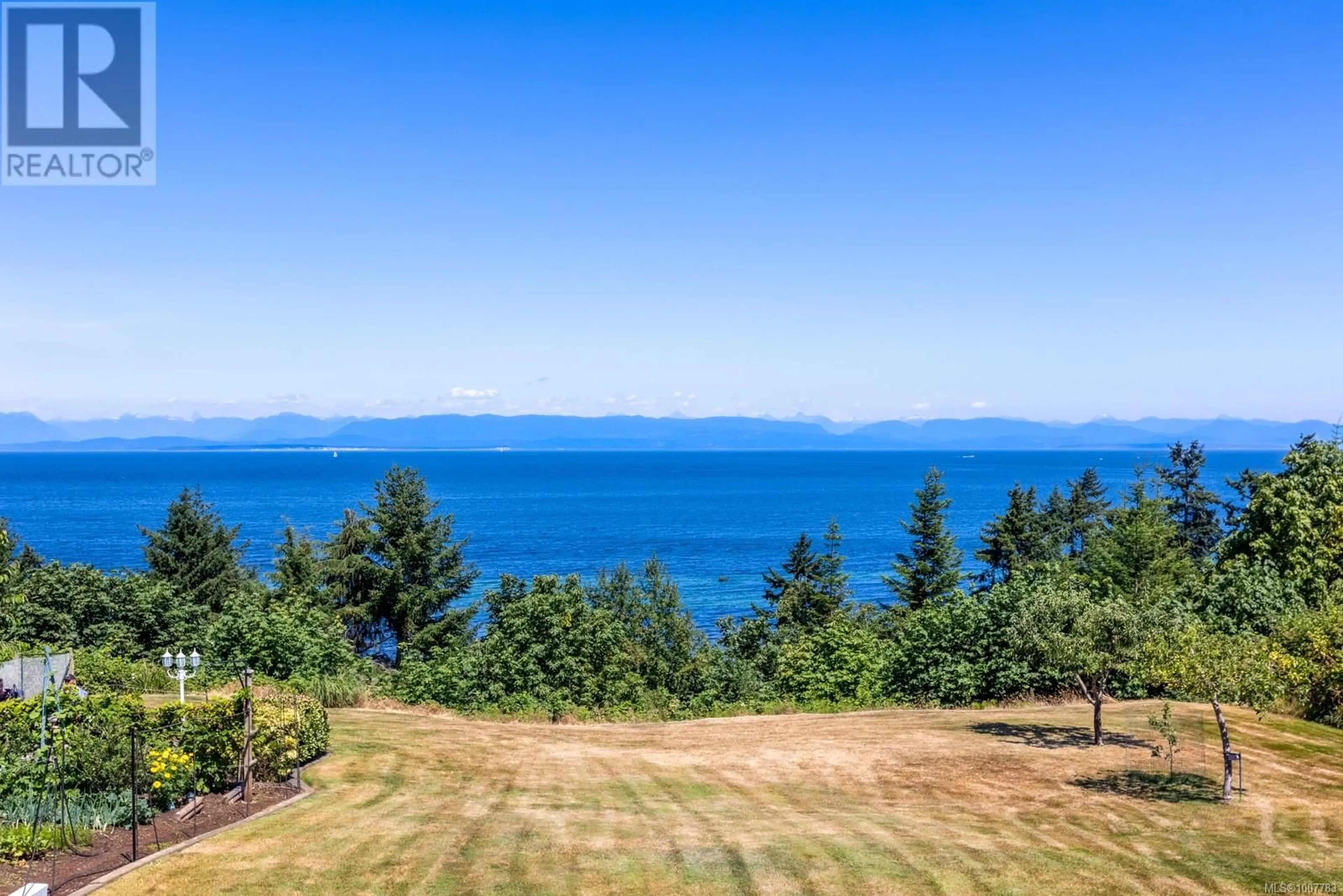 A pic from outside/outdoor area/front of a property/back of a property/a pic from drone, water/lake/river/ocean view for 6348 EAGLES DRIVE, Courtenay British Columbia V9J1V4