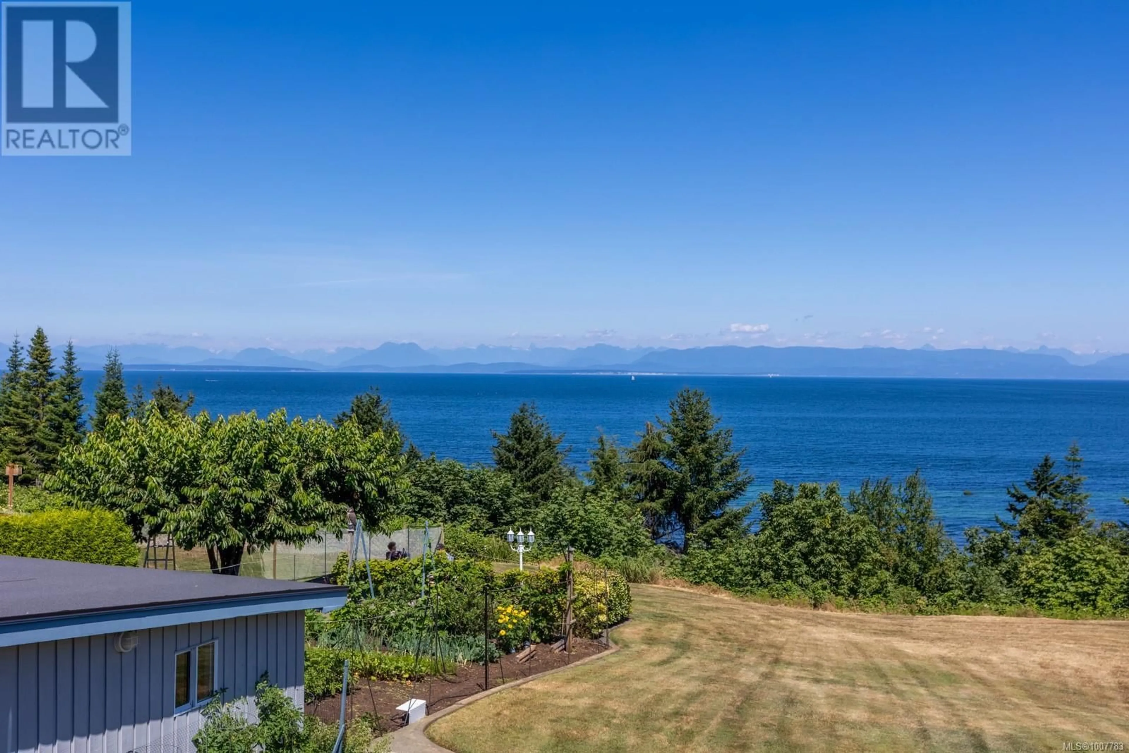 A pic from outside/outdoor area/front of a property/back of a property/a pic from drone, water/lake/river/ocean view for 6348 EAGLES DRIVE, Courtenay British Columbia V9J1V4