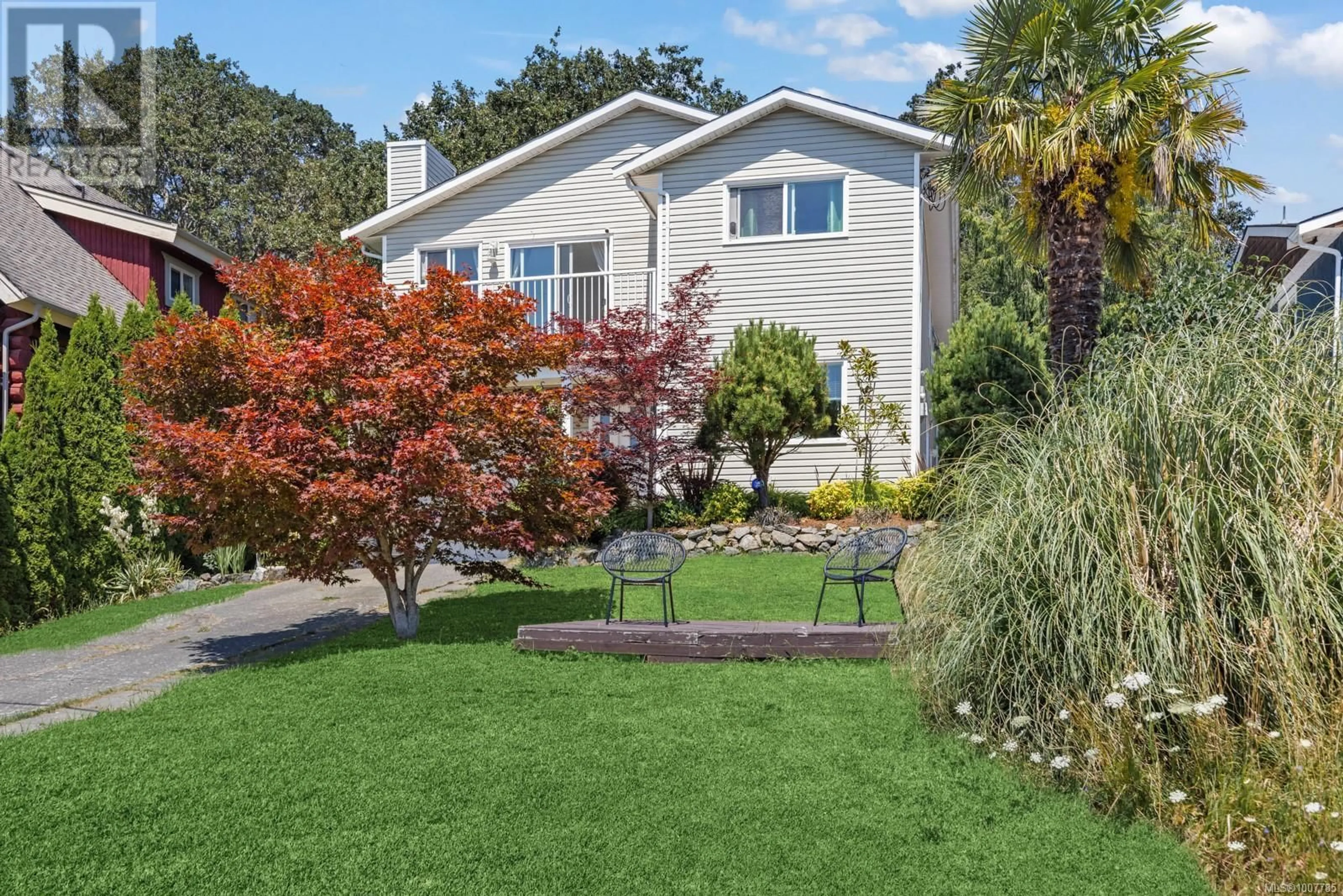 Home with vinyl exterior material, street for 1338 PRILLAMAN AVENUE, Saanich British Columbia V9E2C6