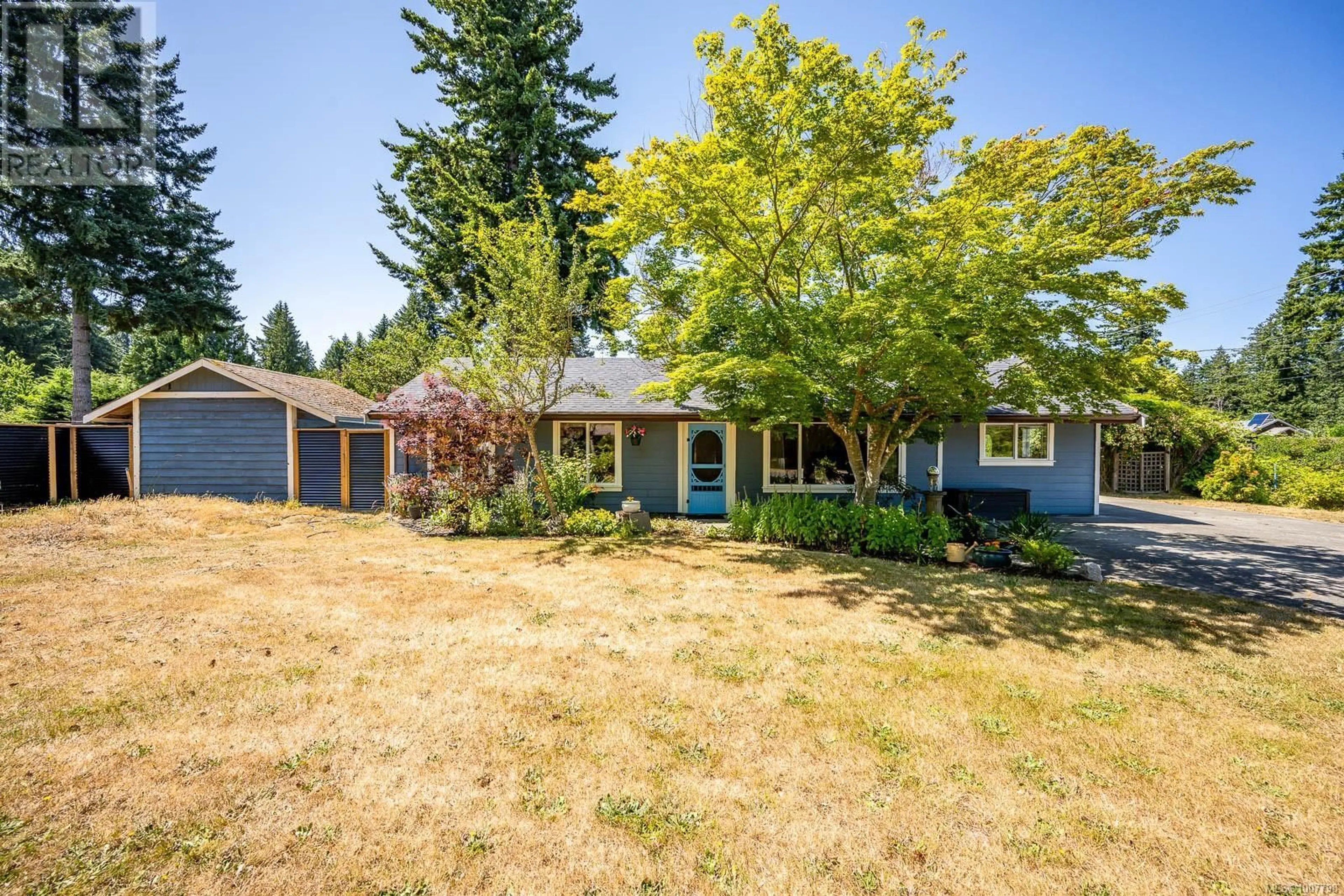 A pic from outside/outdoor area/front of a property/back of a property/a pic from drone, street for 1539 SETON DRIVE, Comox British Columbia V9M3Z7