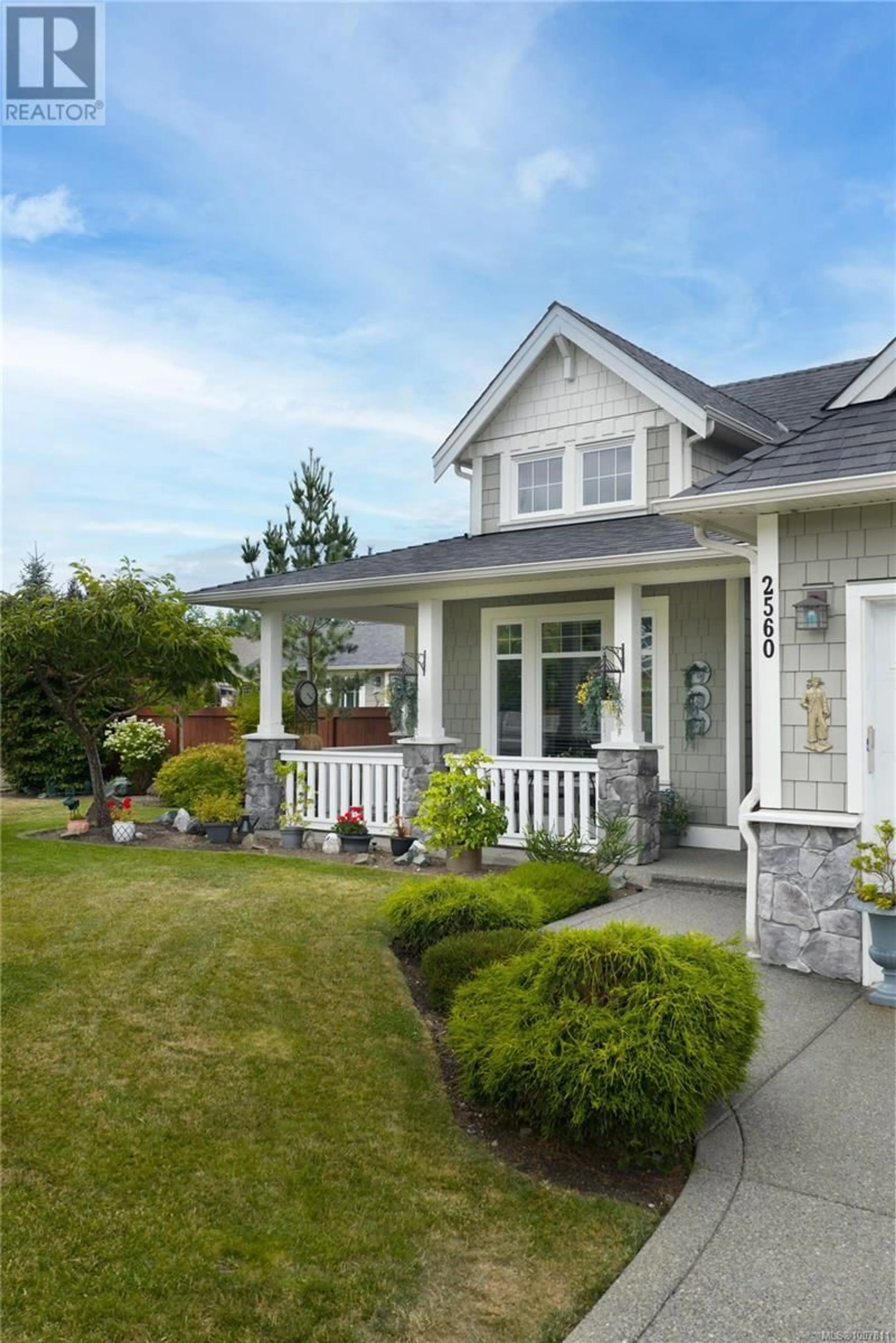 Home with vinyl exterior material, street for 2560 FAULKNER PLACE, Mill Bay British Columbia V0R2P2
