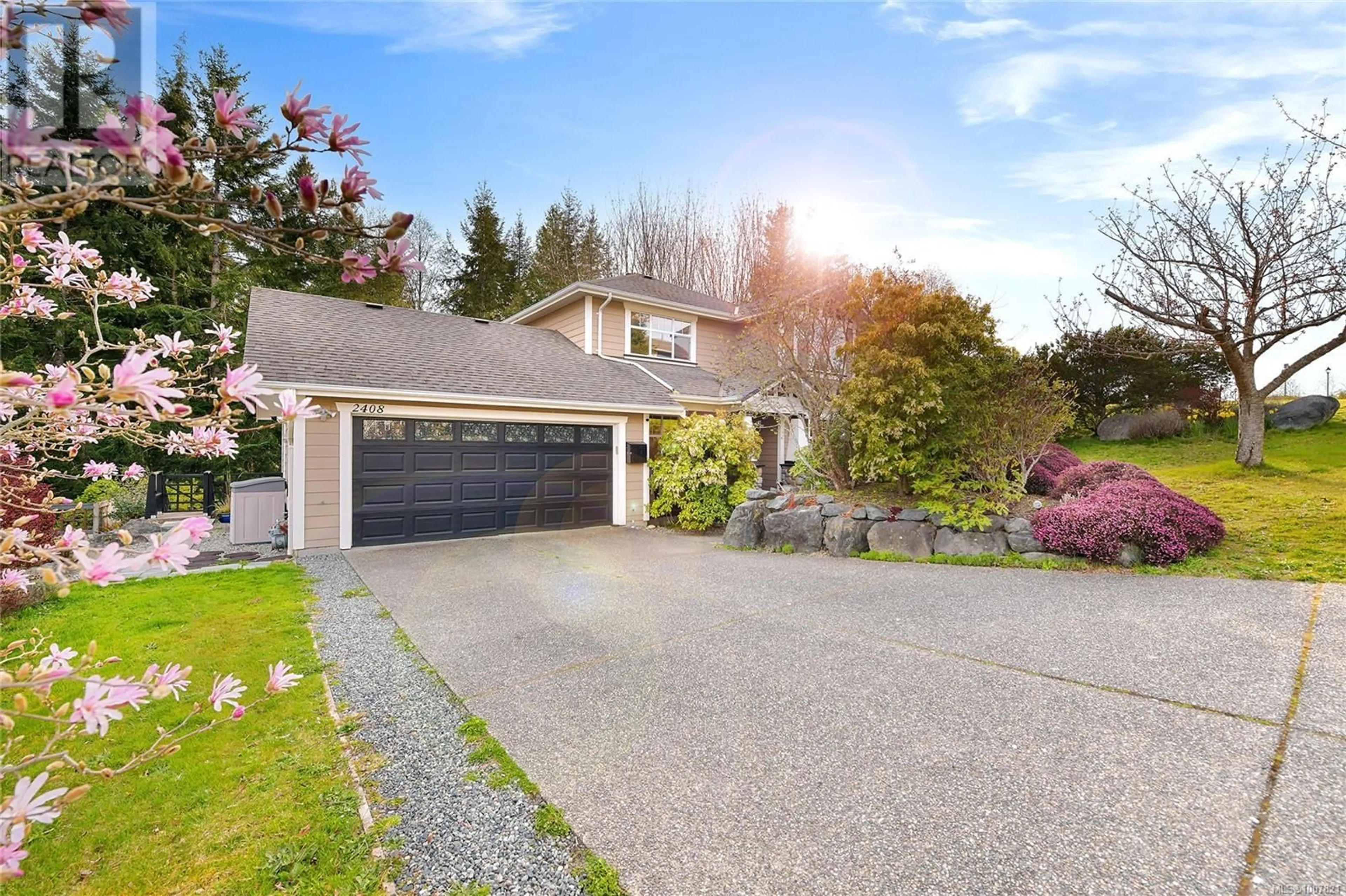 Home with vinyl exterior material, street for 2408 SUNRIVER WAY, Sooke British Columbia V0S1N0