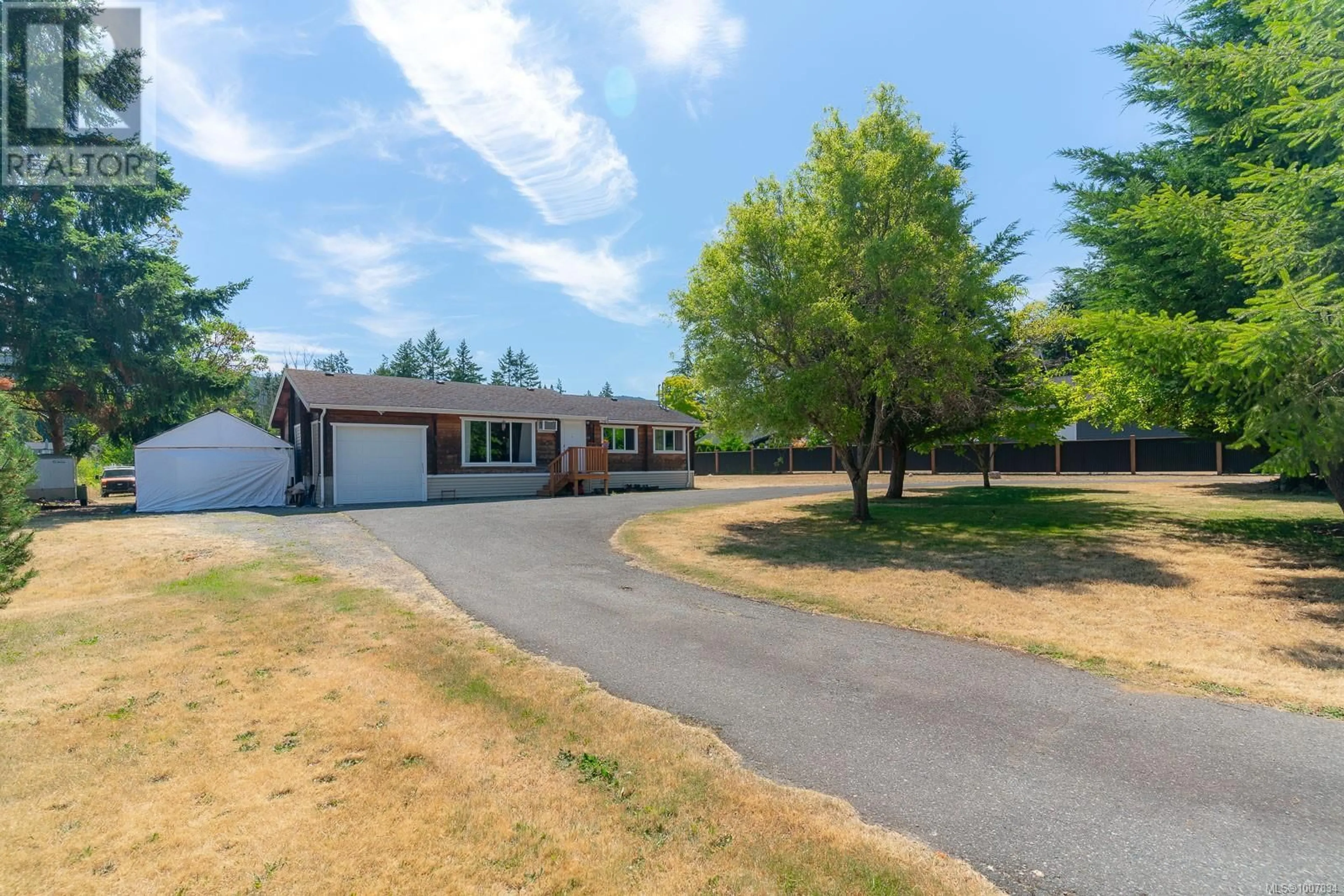 A pic from outside/outdoor area/front of a property/back of a property/a pic from drone, street for 7425 LANTZVILLE ROAD, Lantzville British Columbia V0R2H0
