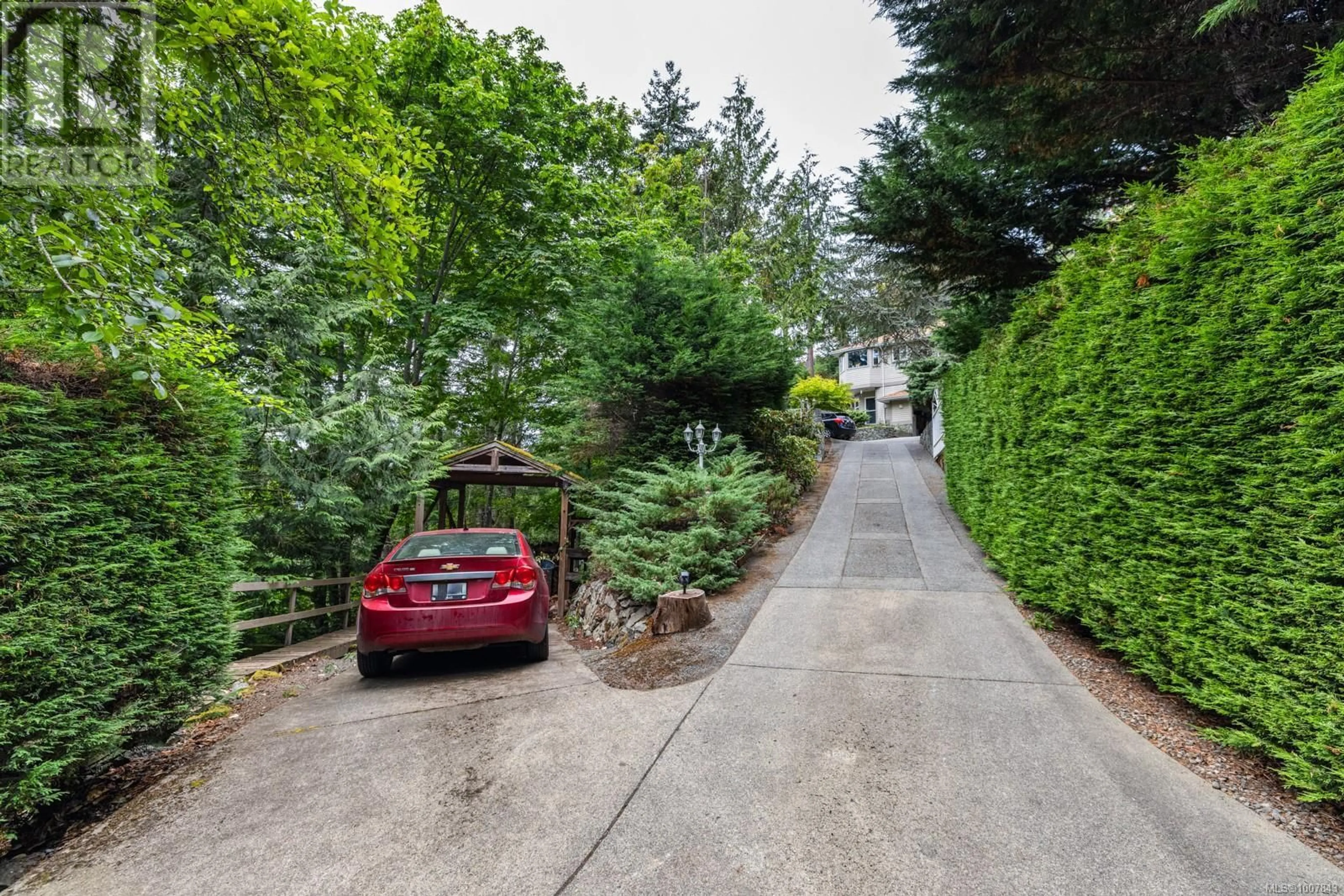 A pic from outside/outdoor area/front of a property/back of a property/a pic from drone, street for 567 MAPLE MOUNTAIN ROAD, Duncan British Columbia V9L5X7