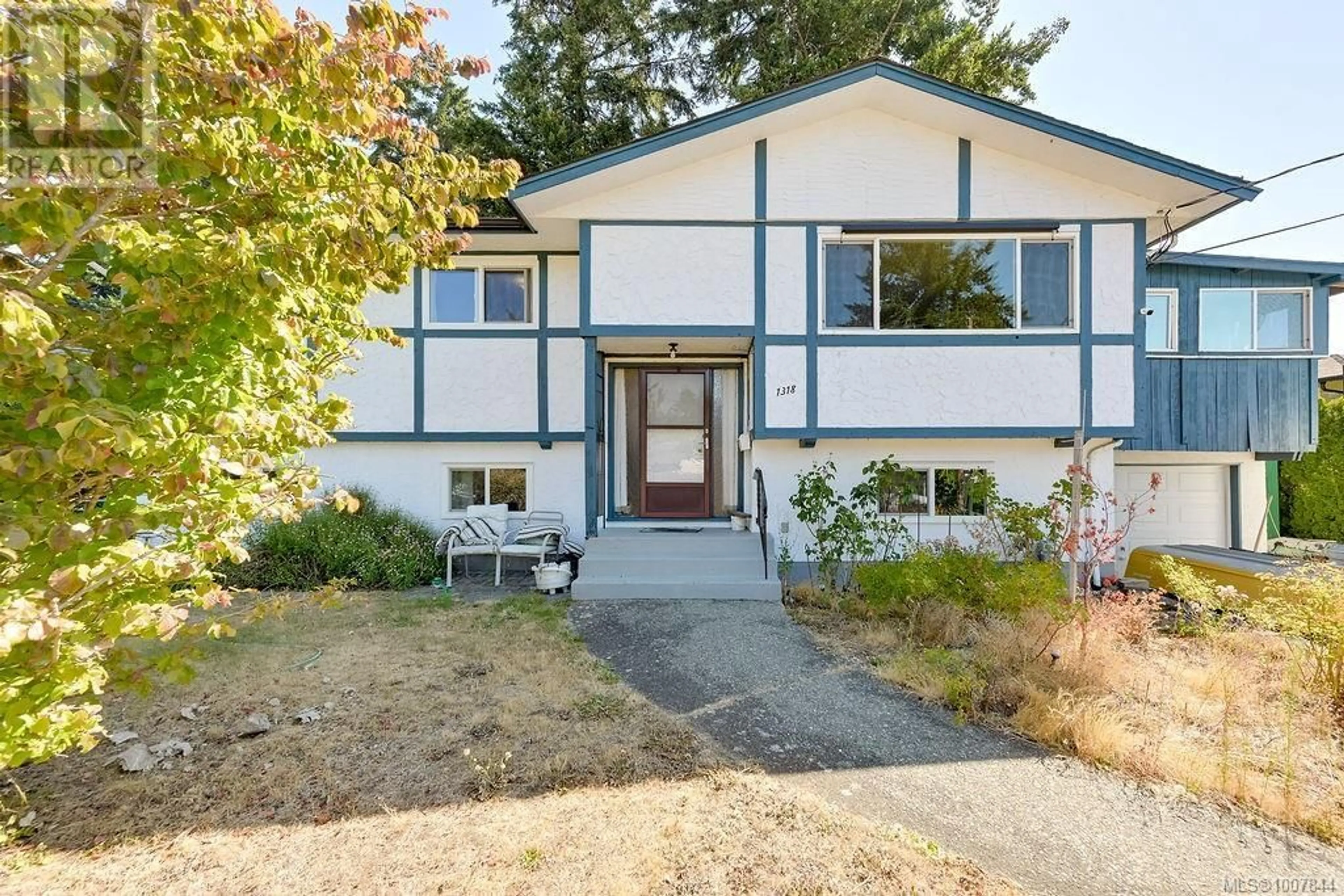 Home with vinyl exterior material, street for 1318 GLENRIDGE DRIVE, Langford British Columbia V9B2M4