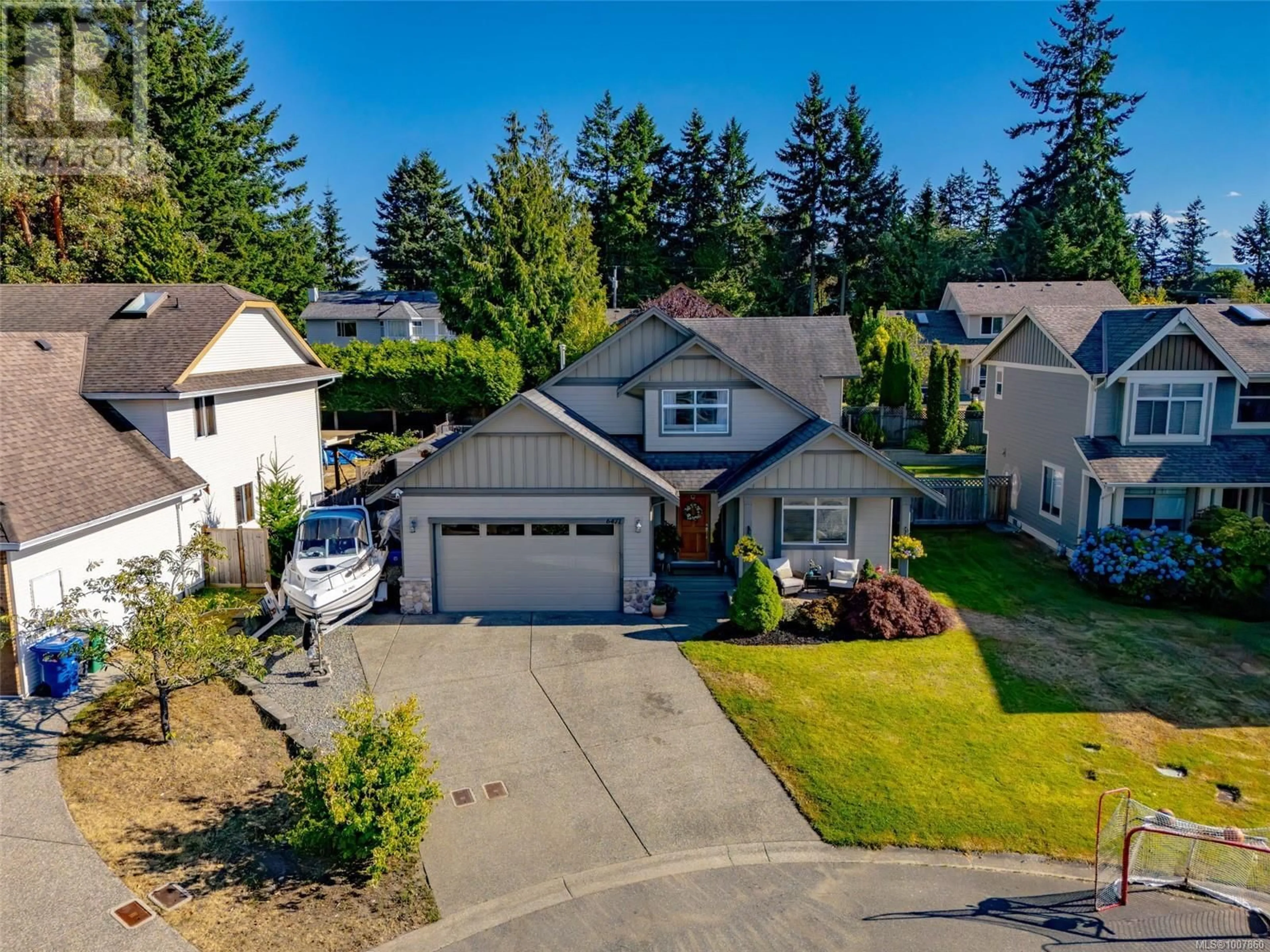 A pic from outside/outdoor area/front of a property/back of a property/a pic from drone, street for 6471 THORNWOOD PLACE, Nanaimo British Columbia V9V1V9