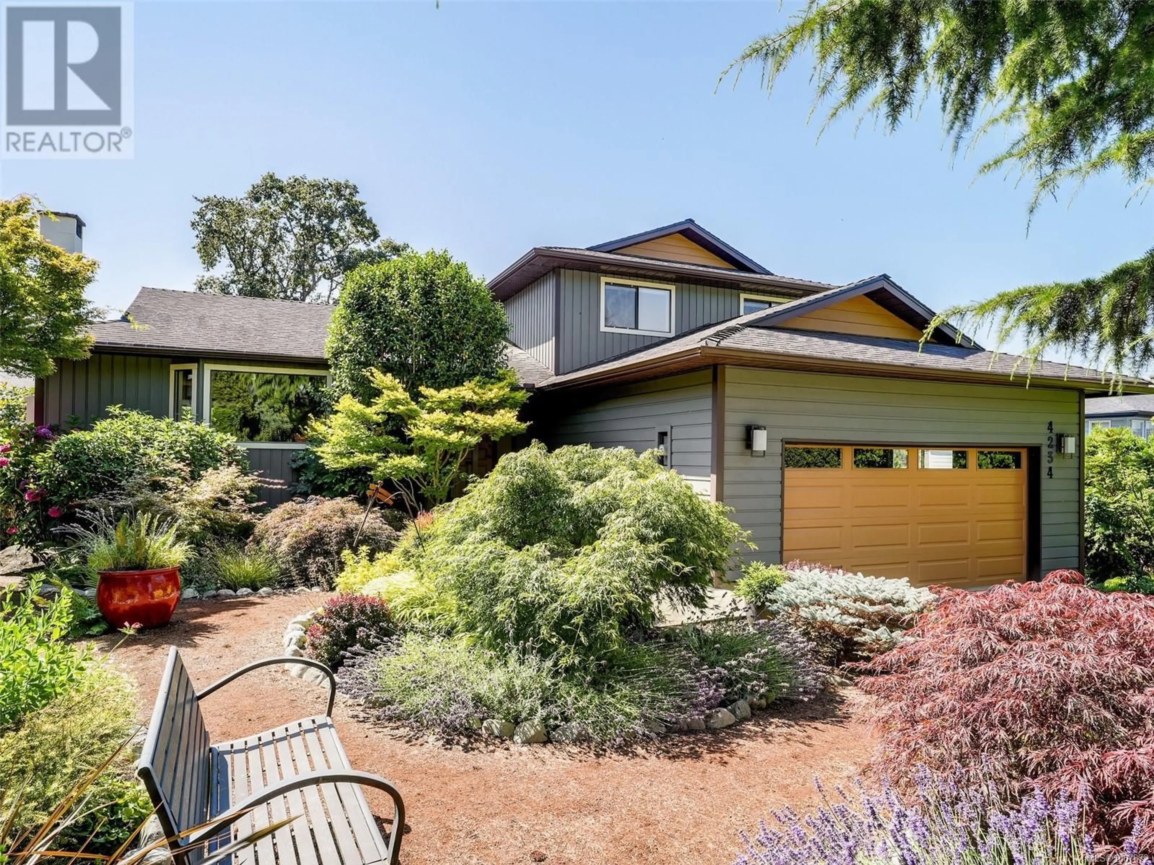 Home with vinyl exterior material, street for 4234 PANORAMA DRIVE, Saanich British Columbia V8X2M7