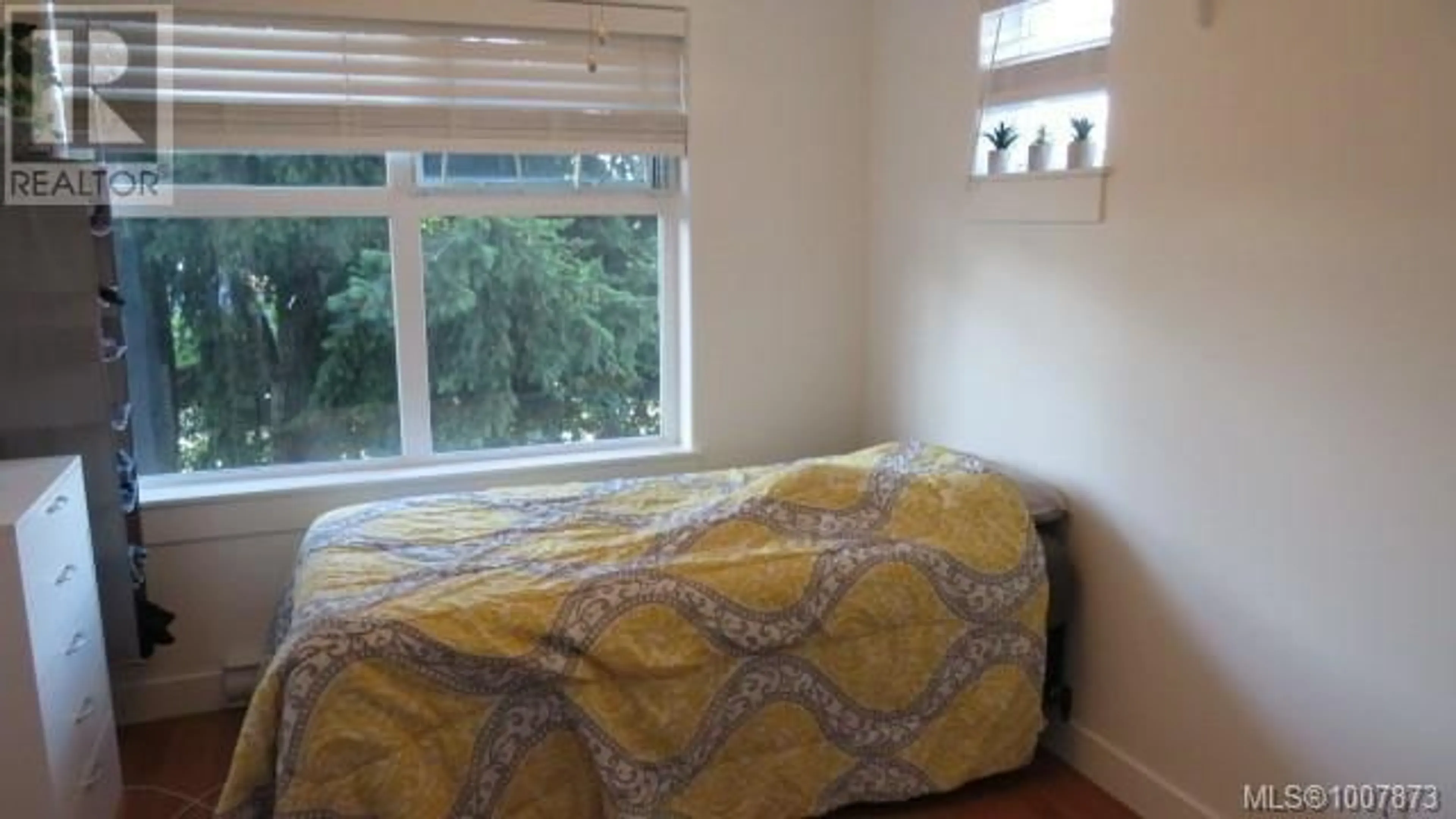 Bedroom with bed, floor is not visible for 321 - 2829 PEATT ROAD, Langford British Columbia V9B3V5